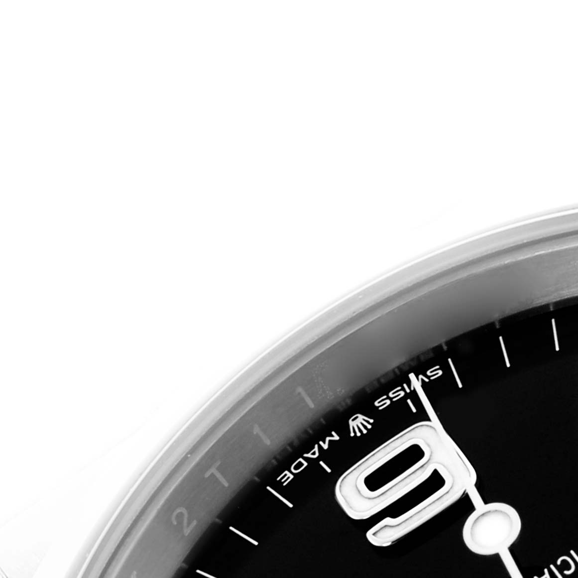 The image shows a partial view of the dial of a Rolex Explorer 124270 Men's Stainless Steel Black Dial 124270 Men's Stainless Steel Black Dial watch, highlighting the number 9 and the text "Swiss Made."
