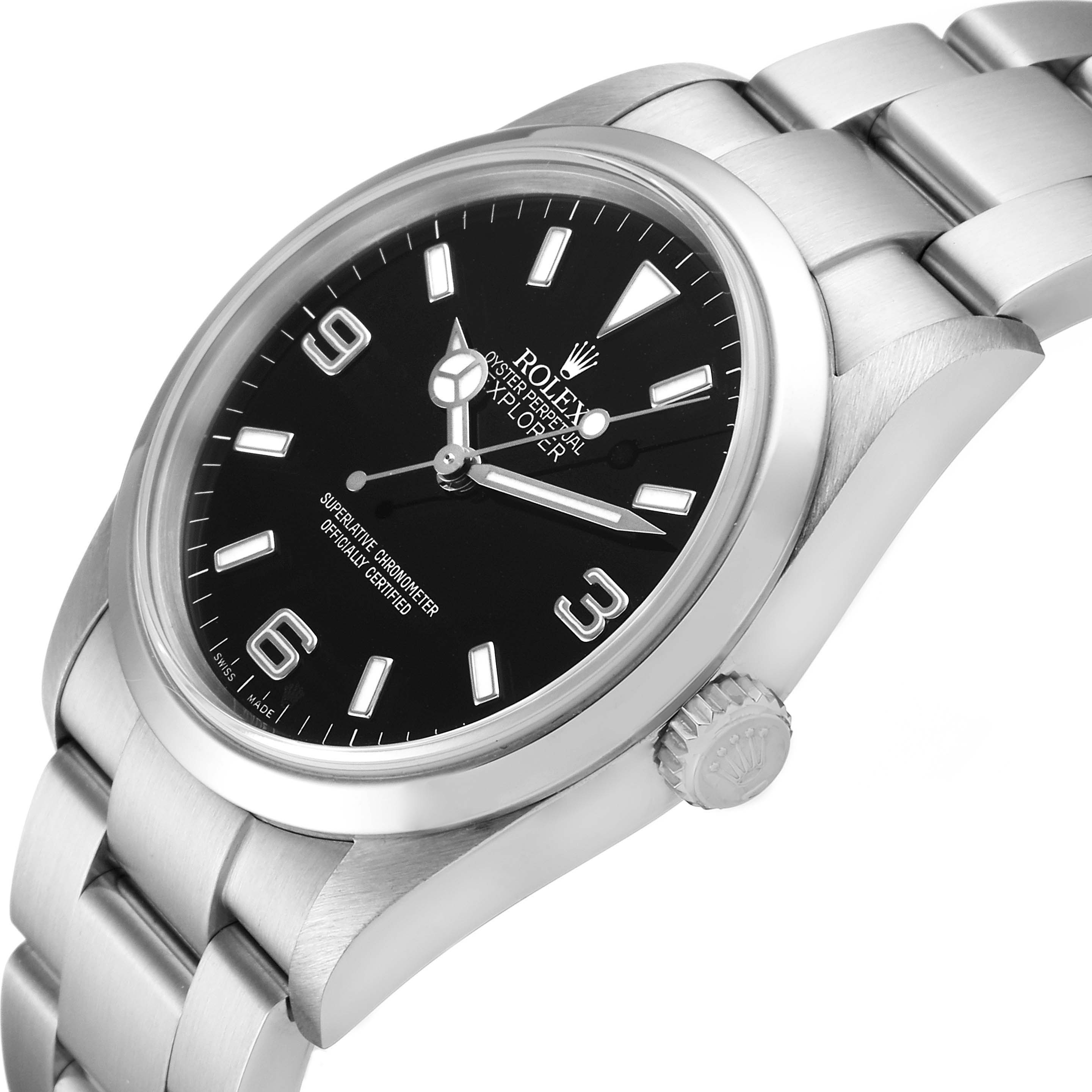 The image shows a side view of a Rolex Explorer 114270 Men's Stainless Steel Black Dial 114270 Men's Stainless Steel Black Dial wristwatch, highlighting its black dial, crown, and stainless steel bracelet.