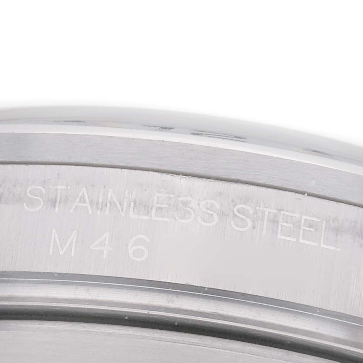 The image shows a close-up of the side of a Rolex Explorer 16570 Men's Stainless Steel White Dial 16570 Men's Stainless Steel White Dial watch, highlighting the stainless steel engraving.
