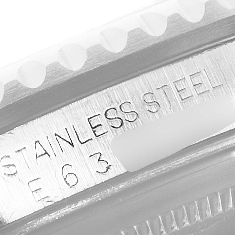 The image shows a close-up of the engraved stainless steel part of a Rolex GMT-Master 16700 Men's Stainless Steel Black Dial 16700 Men's Stainless Steel Black Dial watch caseback.