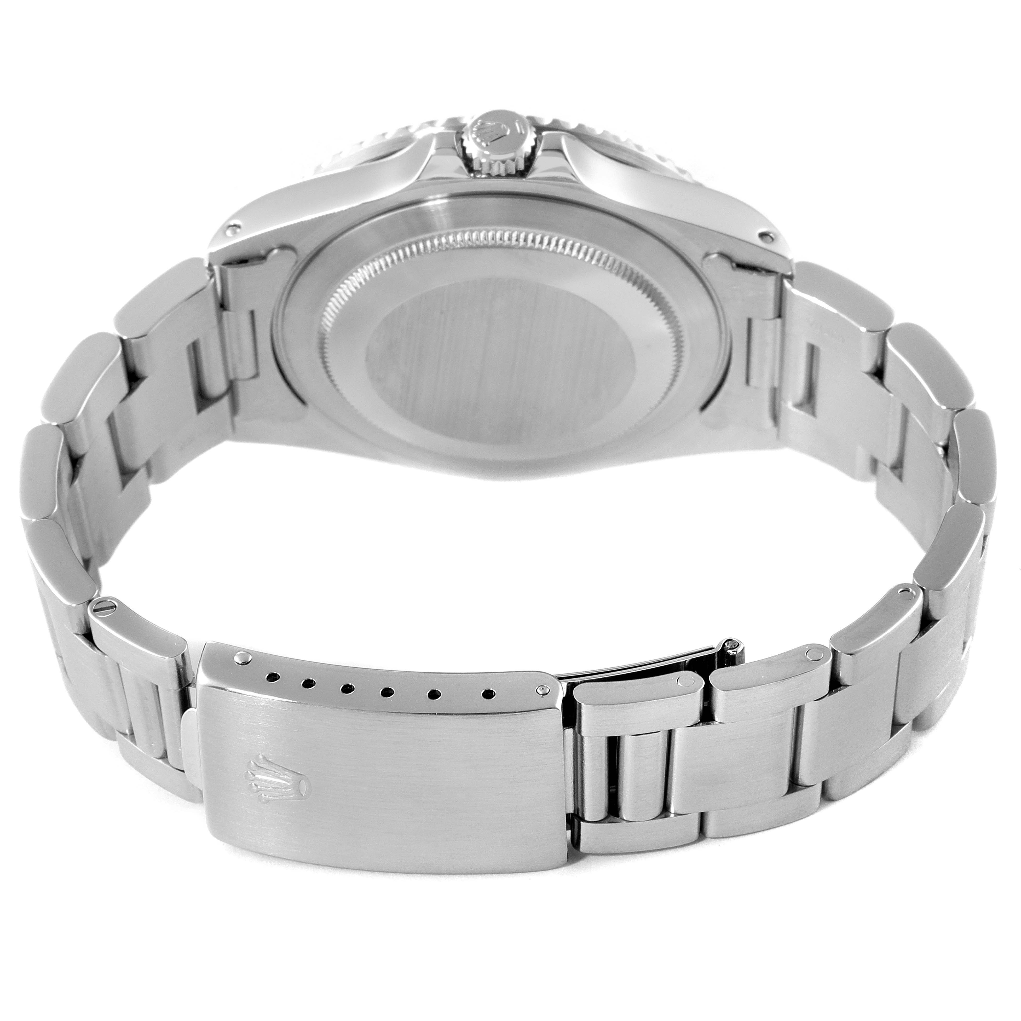 The image shows the backside and clasp of a Rolex GMT-Master 16700 Men's Stainless Steel Black Dial 16700 Men's Stainless Steel Black Dial watch, focusing on its bracelet and case back.