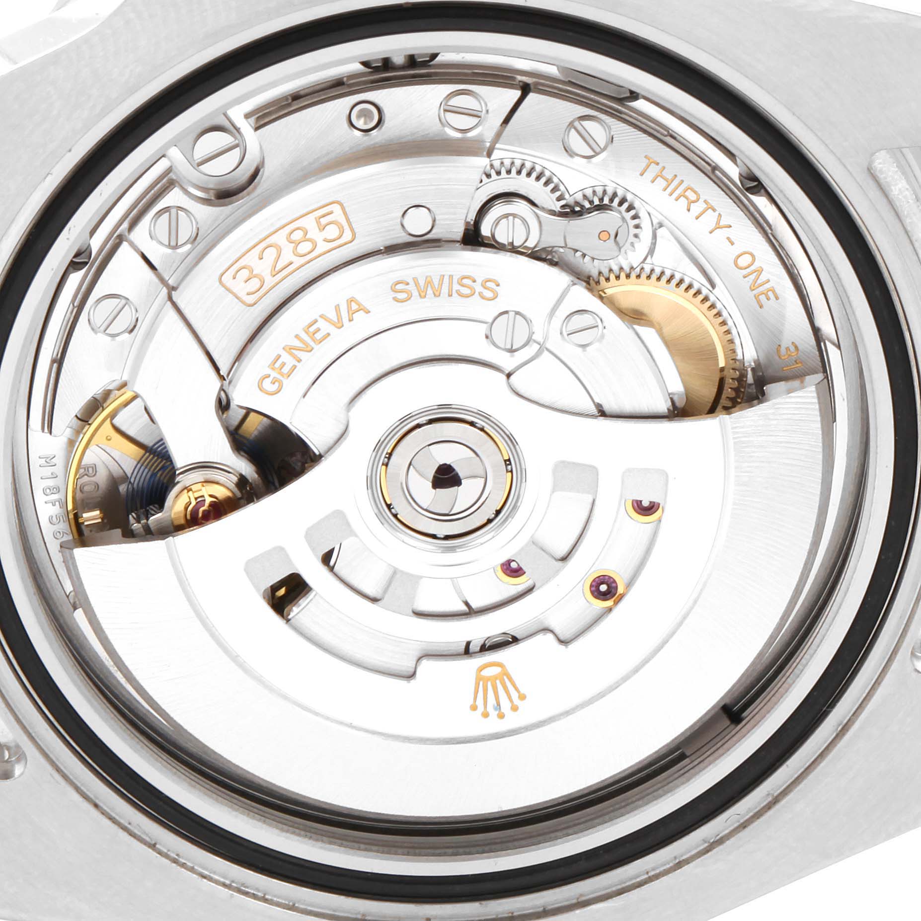 This image shows a close-up view of the movement mechanism inside a Rolex GMT-Master 126710 Men
s Stainless Steel Black Dial 126710 Men
s Stainless Steel Black Dial watch, highlighting its intricate components.