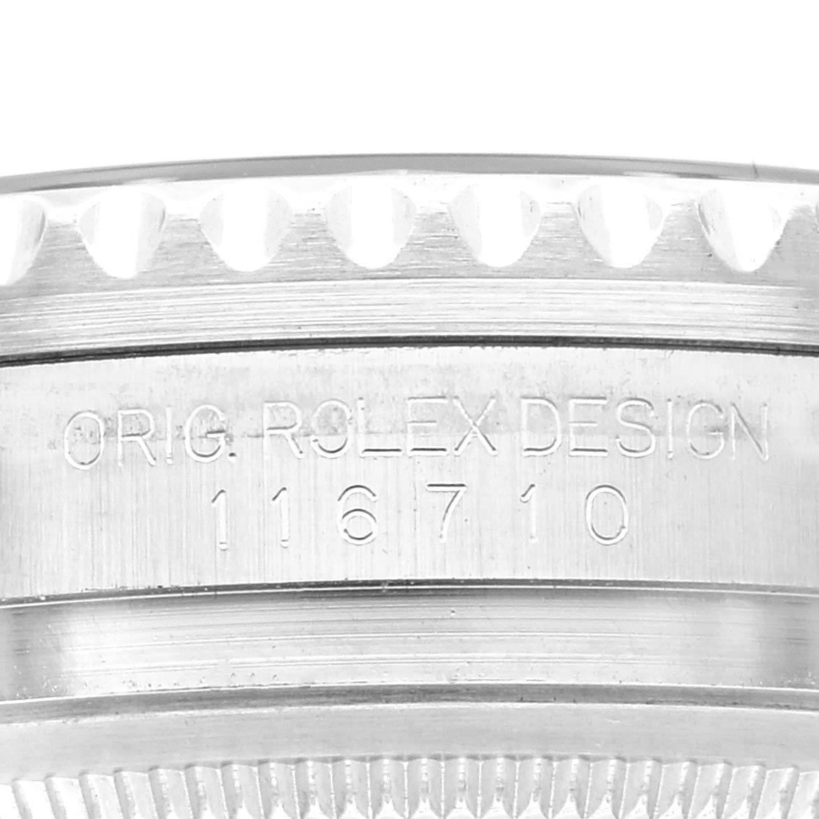 This image shows a close-up of the engraved side of the bezel and case on a Rolex GMT-Master 116710 Men
s Stainless Steel Black Dial 116710 Men
s Stainless Steel Black Dial watch, detailing the model number 116710.