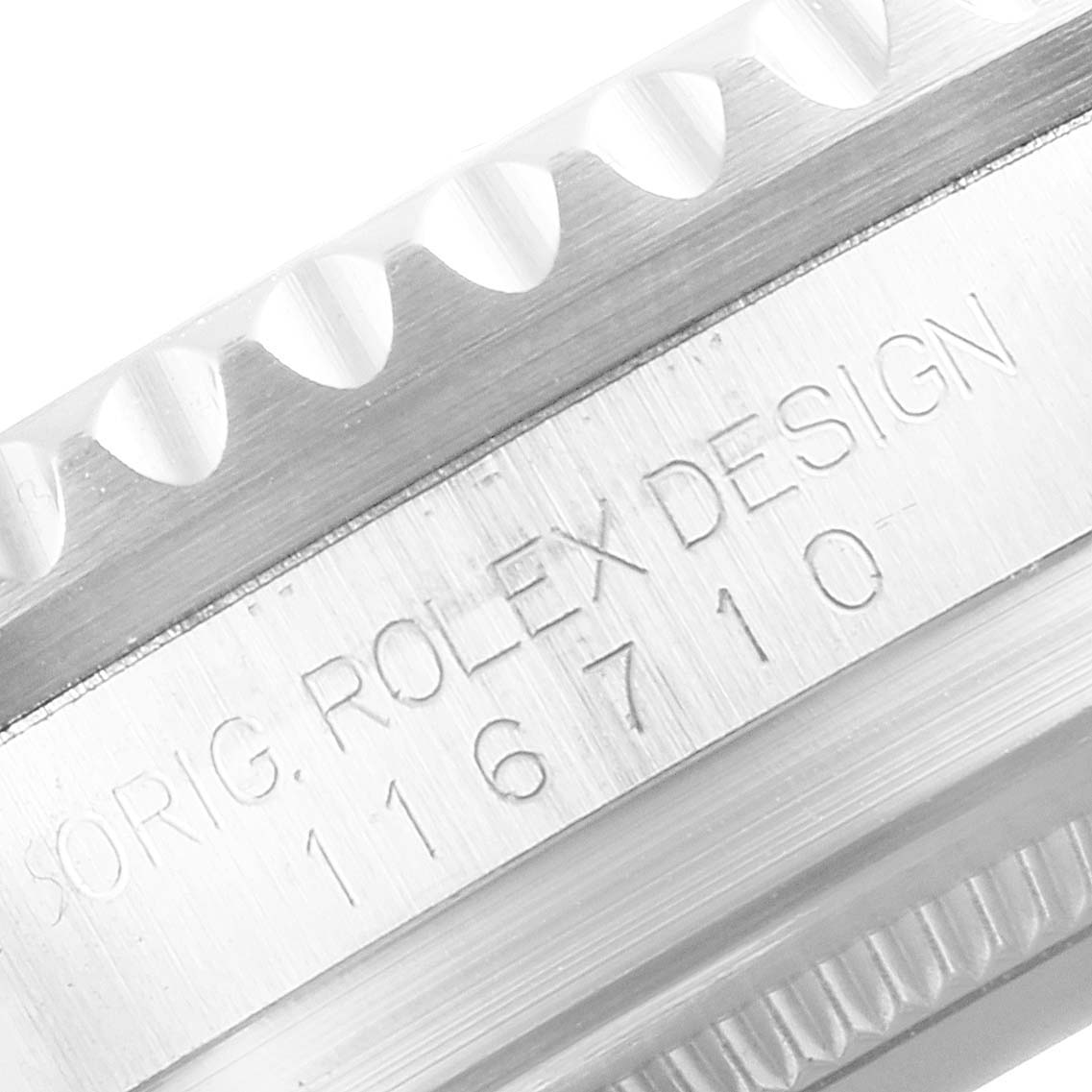 This close-up image shows the side view of a Rolex GMT-Master 116710 Men's Stainless Steel Black Dial 116710 Men's Stainless Steel Black Dial model, highlighting its bezel and engraved model number (116710).