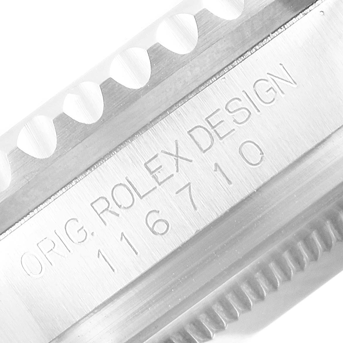 This image shows a close-up of the case side engraving on a Rolex GMT-Master 116710 Men's Stainless Steel Black Dial 116710 Men's Stainless Steel Black Dial model, displaying the model number "116710."