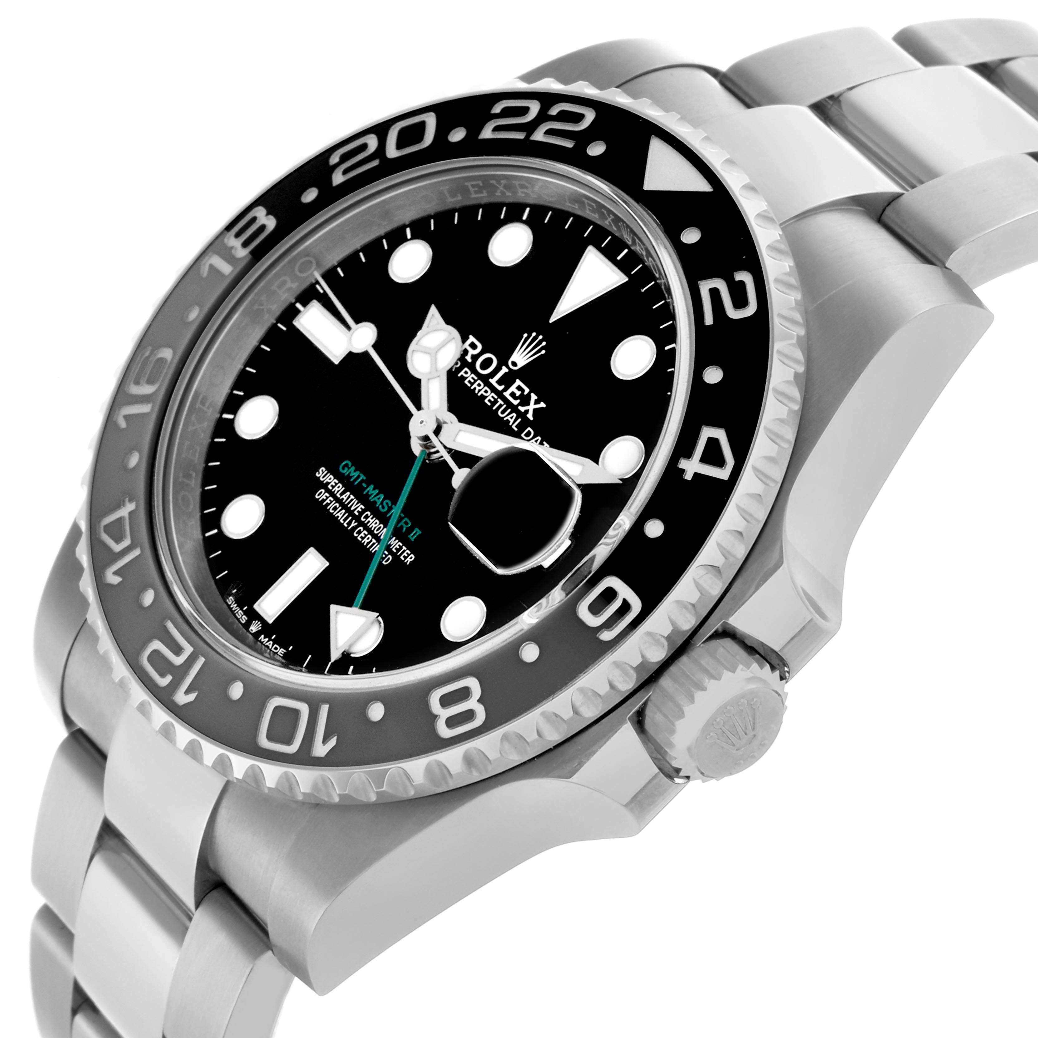 The Rolex GMT-Master 126710GRNR Men's Stainless Steel Black Dial 126710GRNR Men's Stainless Steel Black Dial watch is shown at an angled side view, highlighting the bezel, dial, and partial bracelet.