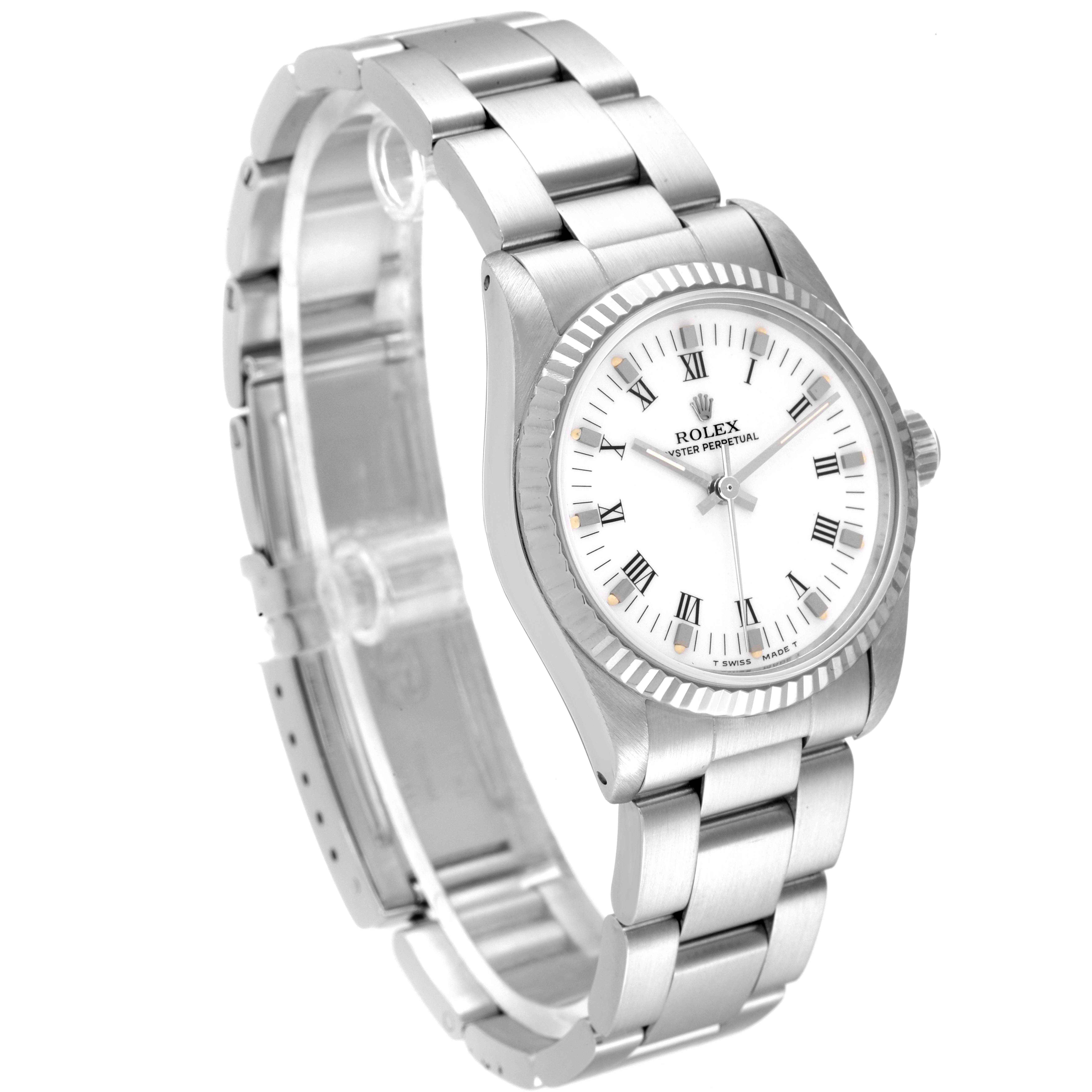This image shows a side angle of a Rolex Mid-Size 67514 Women
s Stainless Steel White Dial 67514 Women
s Stainless Steel White Dial model watch, highlighting the bracelet, case, and dial with Roman numeral markers.