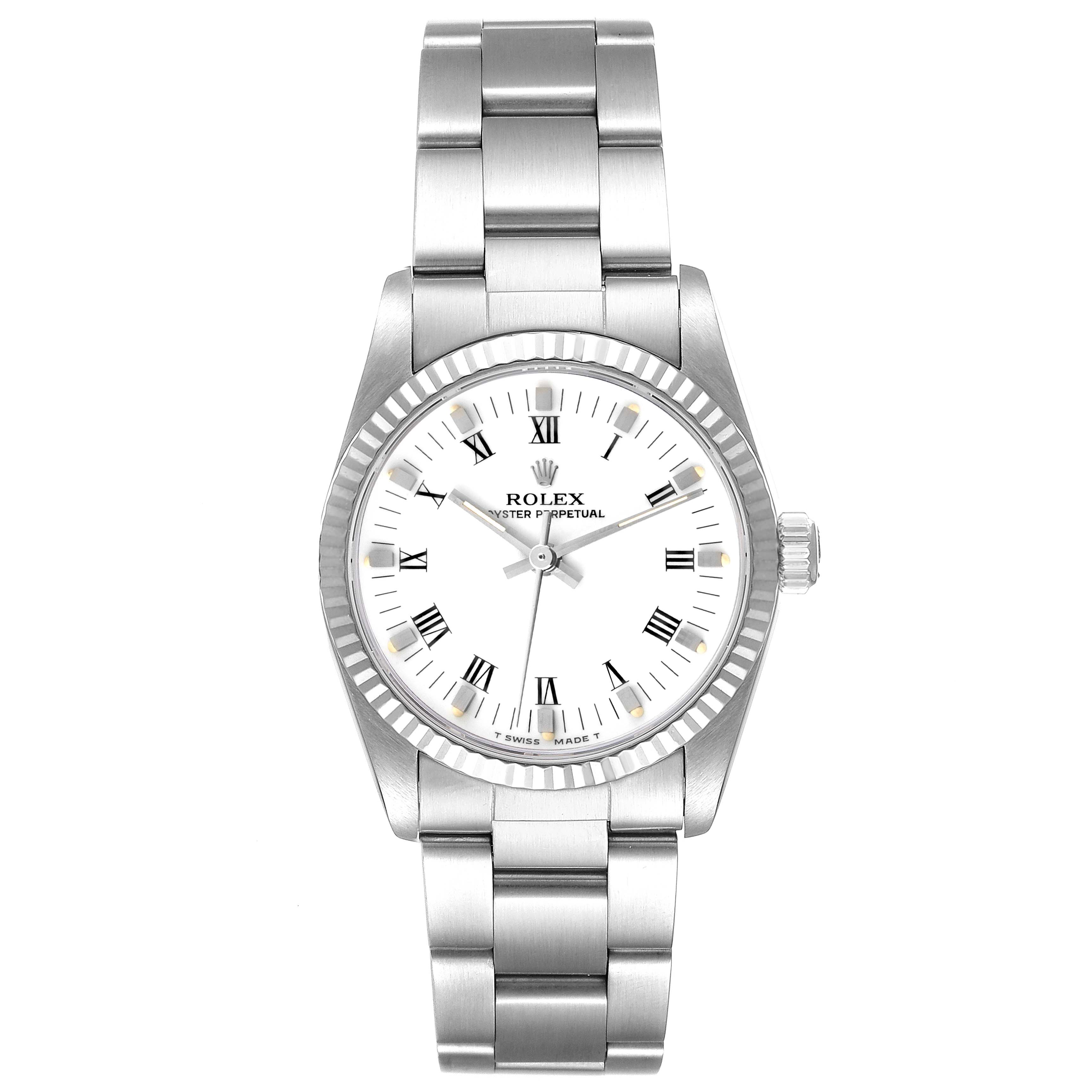 The image shows the front view of a Rolex Mid-Size 67514 Women
s Stainless Steel White Dial 67514 Women
s Stainless Steel White Dial Oyster Perpetual watch with a stainless steel bracelet and white dial with Roman numerals.