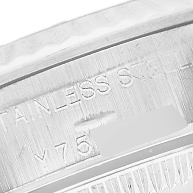 The image shows a close-up of the case back metal markings on a Rolex Oyster Perpetual 76094 Women
s Stainless Steel Black Dial 76094 Women
s Stainless Steel Black Dial watch.