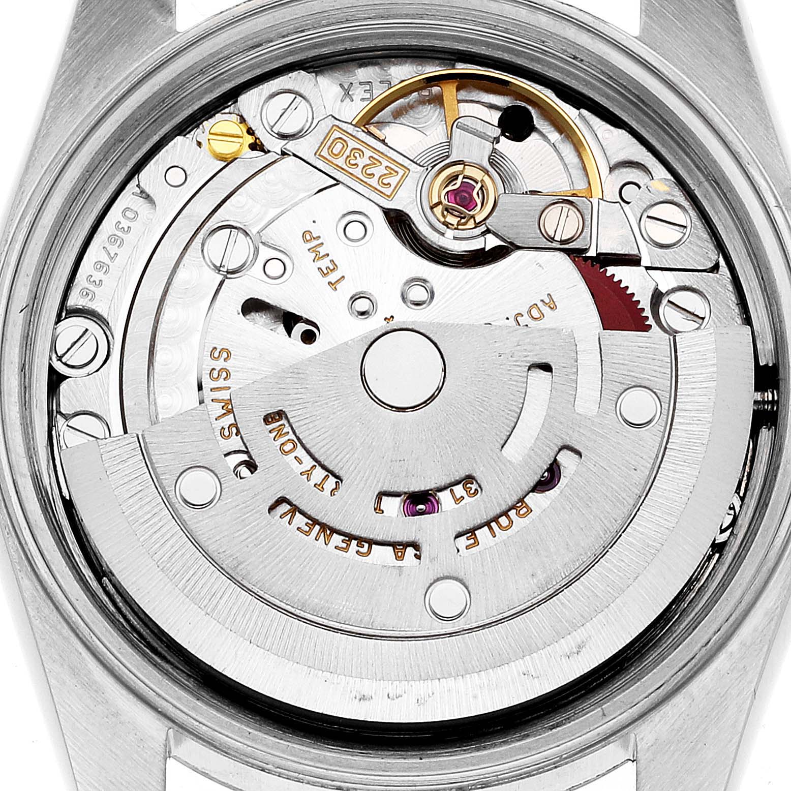 This image shows the intricate internal mechanism of a Rolex Oyster Perpetual 76094 Women
s Stainless Steel Black Dial 76094 Women
s Stainless Steel Black Dial watch viewed from the back.