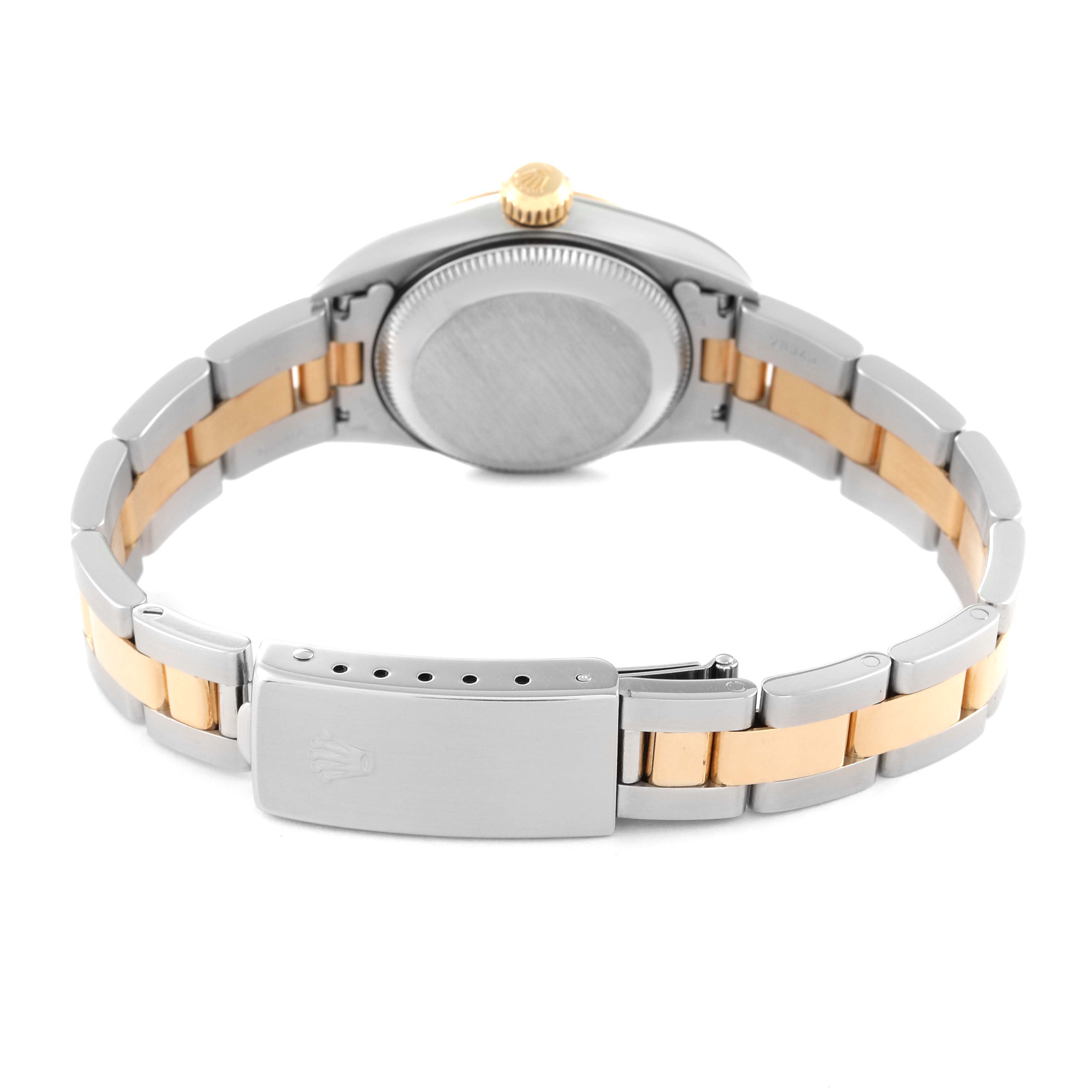 The image shows the back view of a Rolex Oyster Perpetual 67193 Women's Steel and Gold (two tone) Champagne Dial 67193 Women's Steel and Gold (two tone) Champagne Dial watch, highlighting the bracelet and clasp.