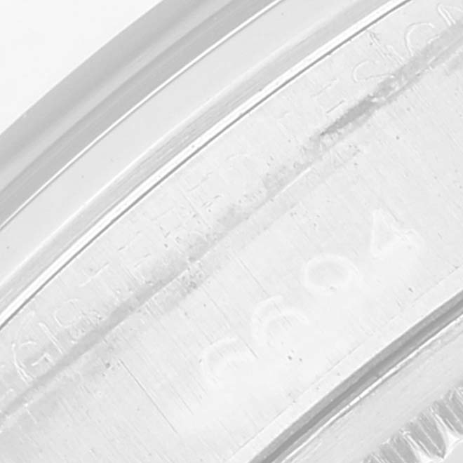 This close-up image shows the engraved details on the caseback of the Rolex Vintage Collection 6694 Men's Stainless Steel Black Dial 6694 Men's Stainless Steel Black Dial watch.