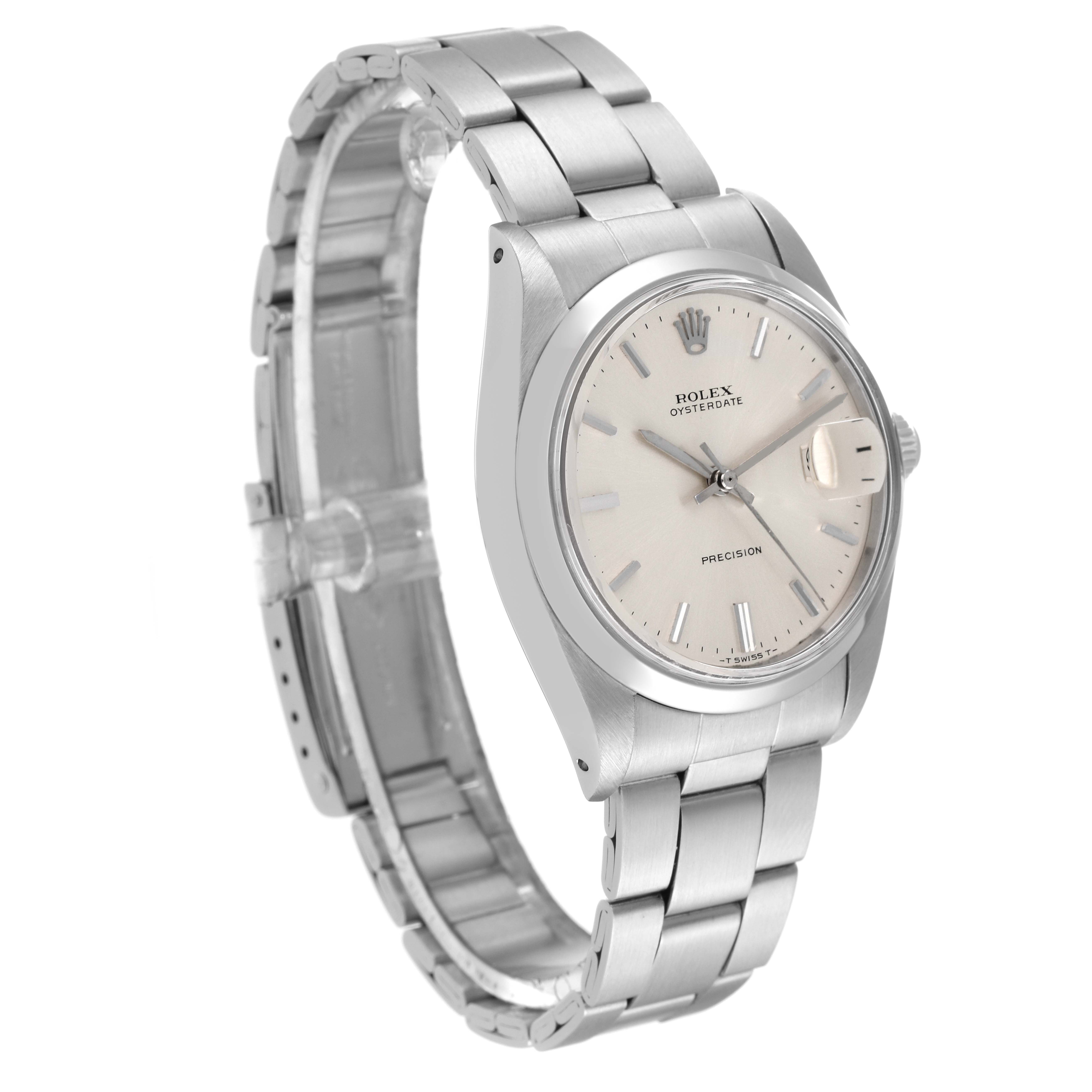 The image shows a side view of a Rolex Vintage Collection 6694 Men
s Stainless Steel Silver Dial 6694 Men
s Stainless Steel Silver Dial watch, highlighting its stainless steel bracelet and bezel.