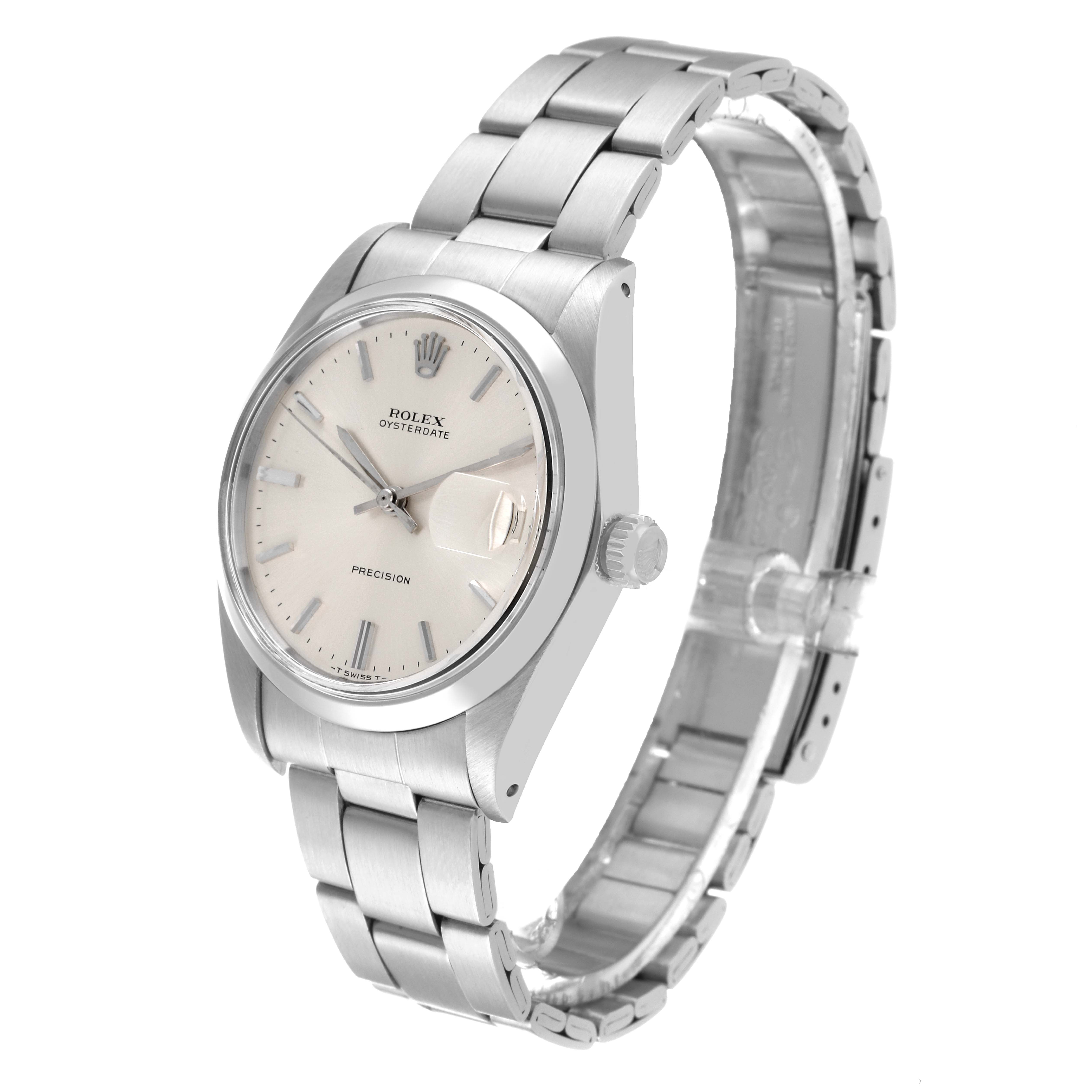 The image shows a Rolex Vintage Collection 6694 Men
s Stainless Steel Silver Dial 6694 Men
s Stainless Steel Silver Dial Oysterdate model watch angled slightly to display its face, crown, and bracelet.