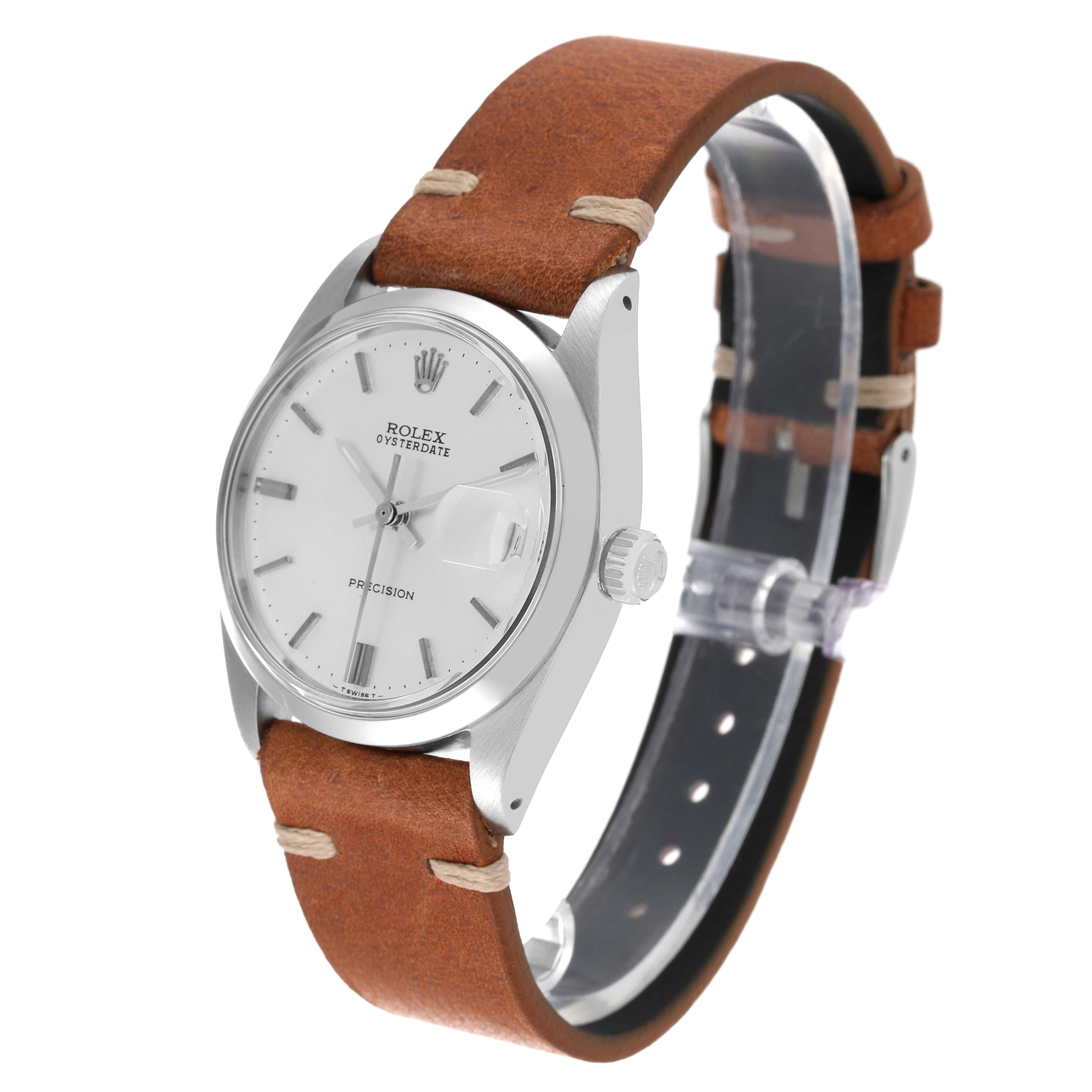 The Vintage Collection Rolex watch is shown at a side angle, highlighting the dial, casing, crown, and leather strap.