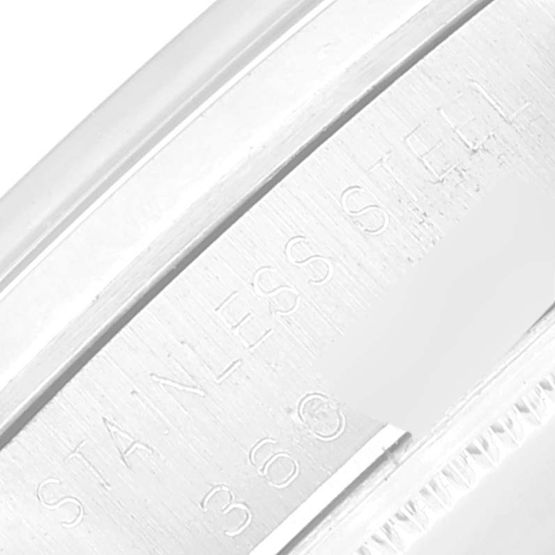This close-up image shows the case back with the “STAINLESS STEEL” inscription on a Rolex Vintage Collection 6694 Men's Stainless Steel Silver Dial 6694 Men's Stainless Steel Silver Dial watch.