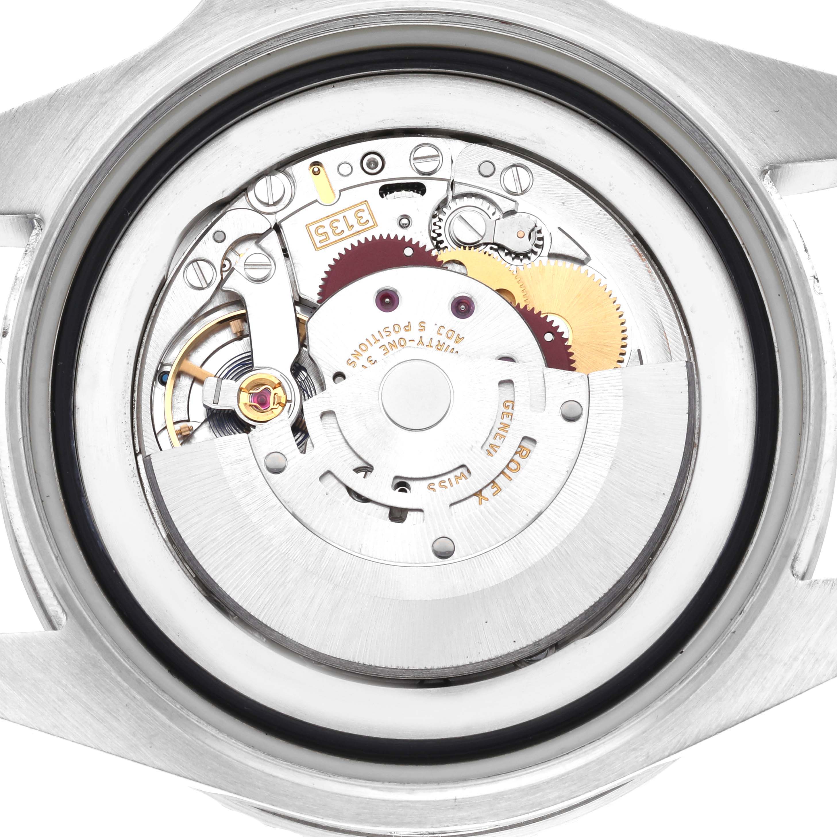 The image shows the internal mechanism of a Rolex Sea-Dweller 116660 Men's Stainless Steel Black Dial 116660 Men's Stainless Steel Black Dial watch with gears and components visible from the back.