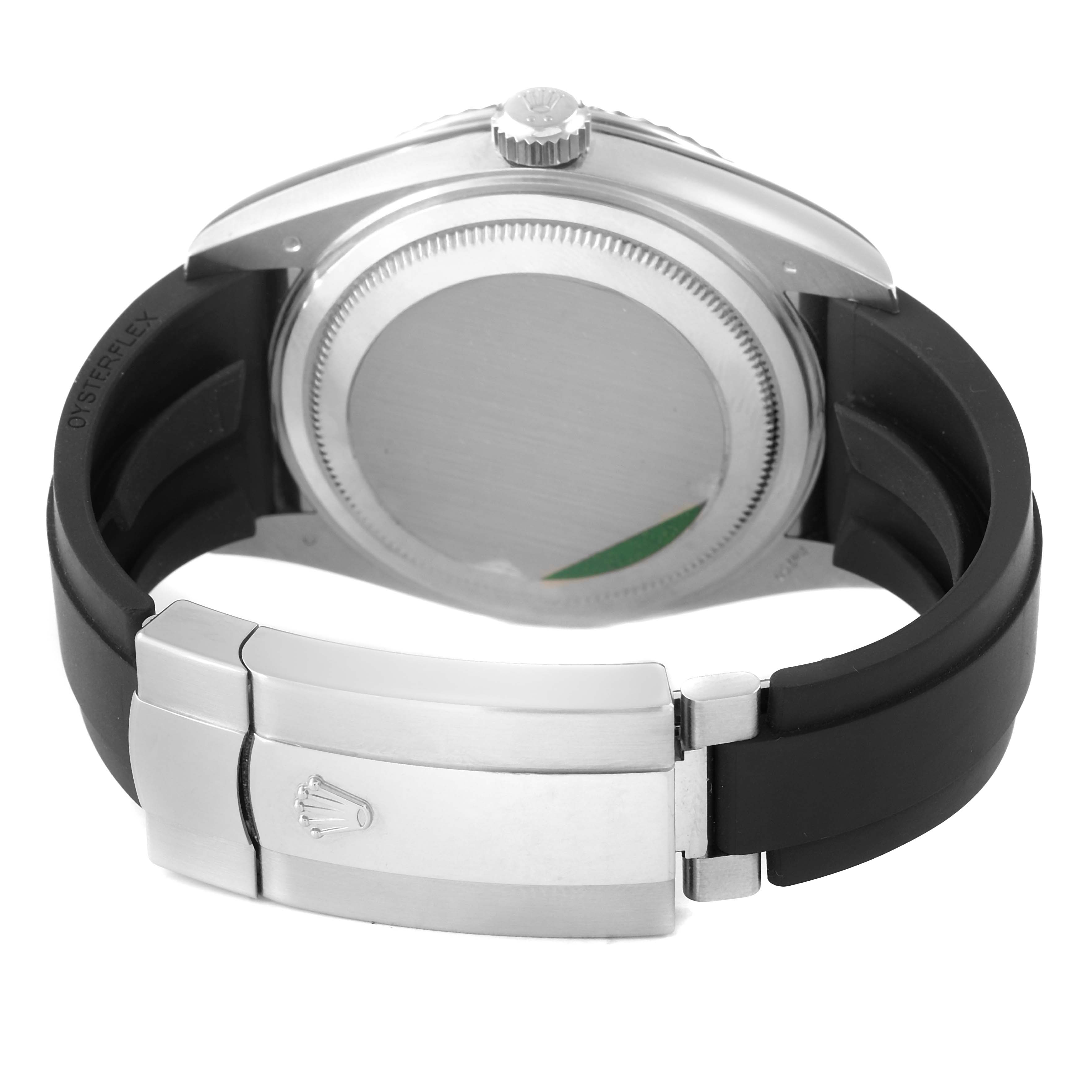 The Rolex Sky-Dweller 336239 Men's White Gold White Dial is shown from the back, highlighting its clasp and rubber strap.