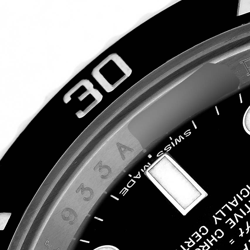 The image shows a close-up of the bezel and part of the dial on a Rolex Submariner 116610 Men's Stainless Steel Black Dial, highlighting the number "30" and Swiss Made markings.