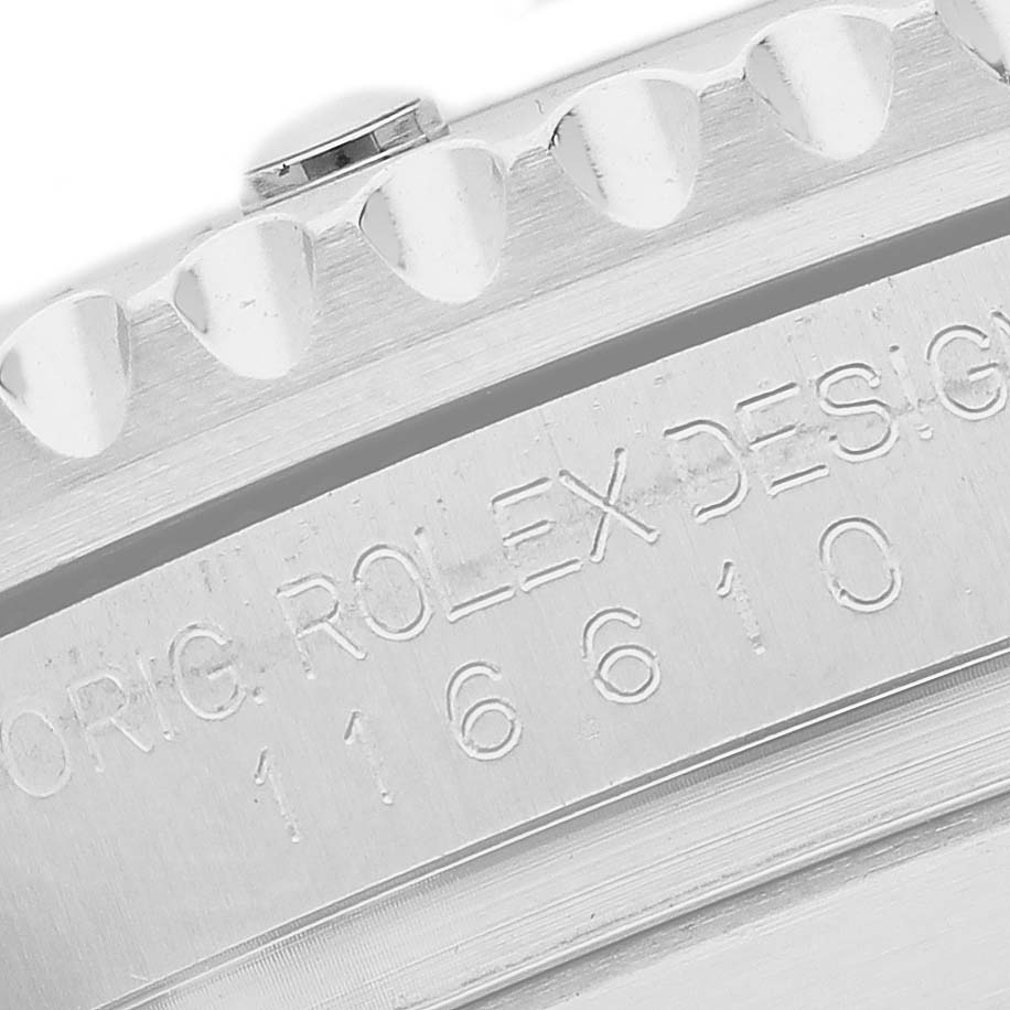 The image shows a close-up of the Rolex Submariner 116610 Men's Stainless Steel Black Dial's bezel and engraved model number.