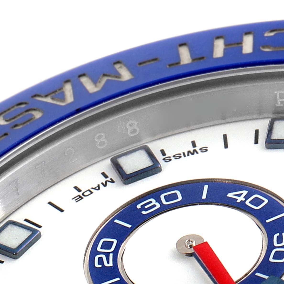 This close-up of the Rolex Yacht-Master 116680 Men's Stainless Steel White Dial 116680 Men's Stainless Steel White Dial watch shows the bezel and part of the dial.