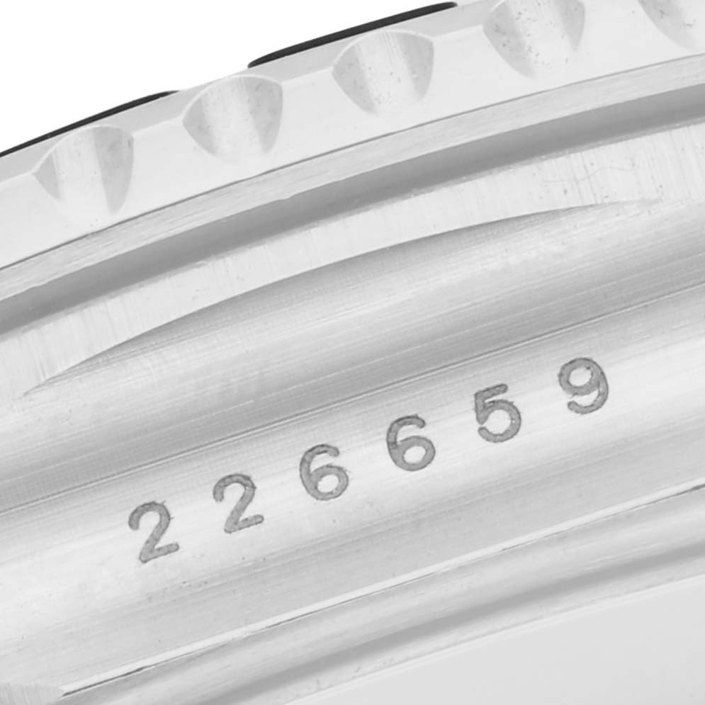 The image shows a close-up of the case side of a Rolex Yacht-Master 226659 Men's White Gold Black Dial, highlighting the engraved serial number.