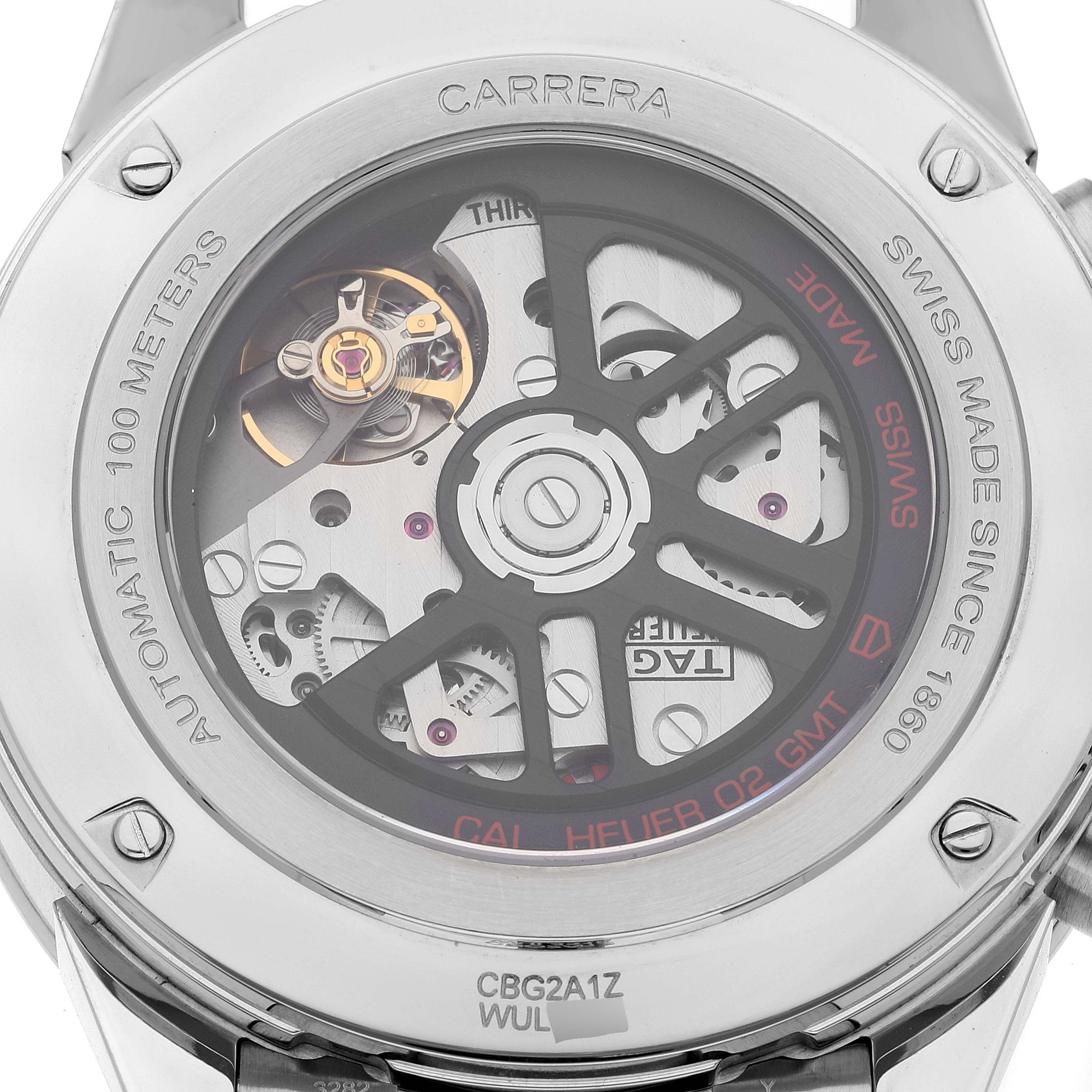 The image shows the back of a Tag Heuer Carrera CBG2A1Z.BA0658 Men's Stainless Steel Black Dial CBG2A1Z.BA0658 Men's Stainless Steel Black Dial watch, displaying its intricate internal mechanism and engraving details.