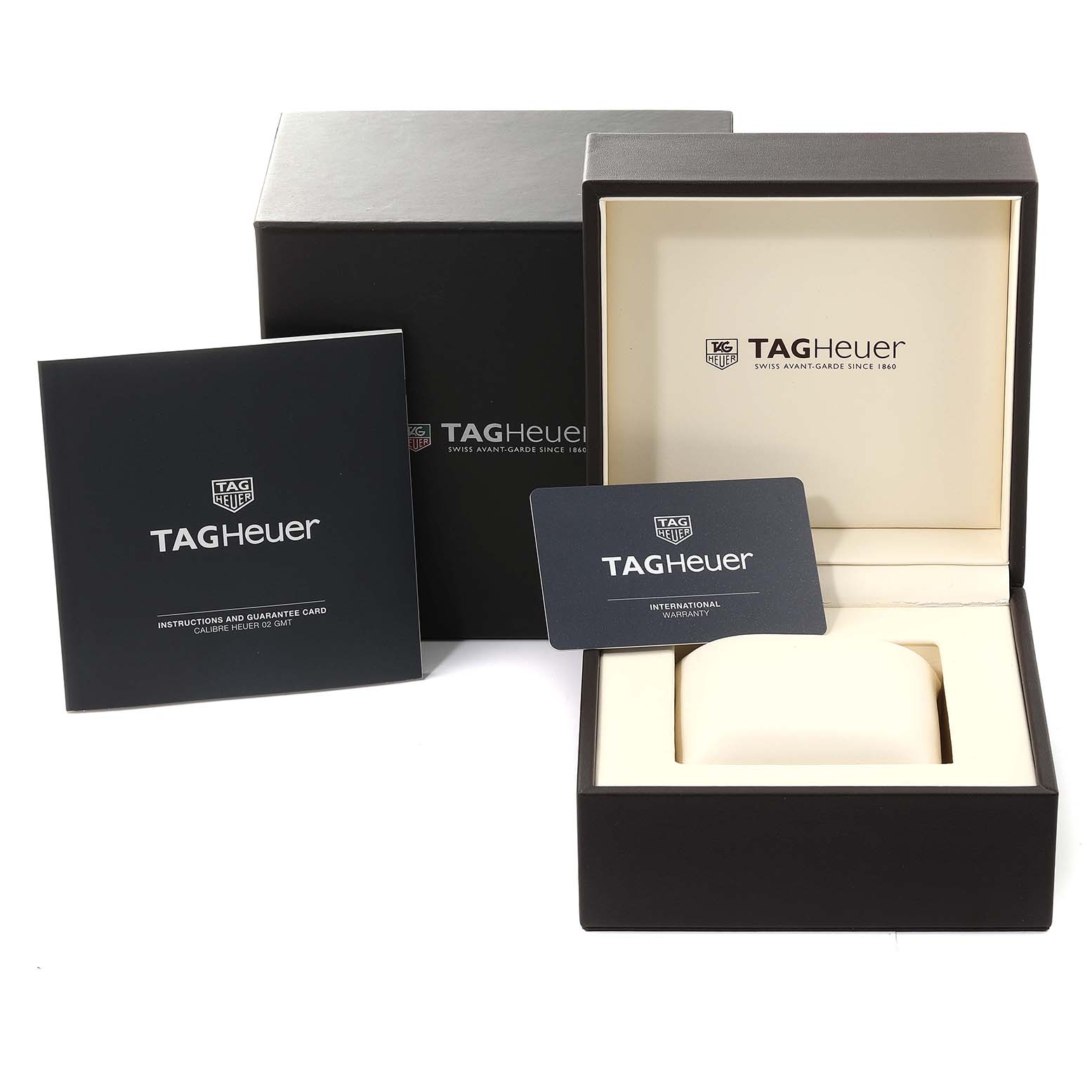 The image shows the box, warranty card, and instruction manual for the Carrera model by Tag Heuer.