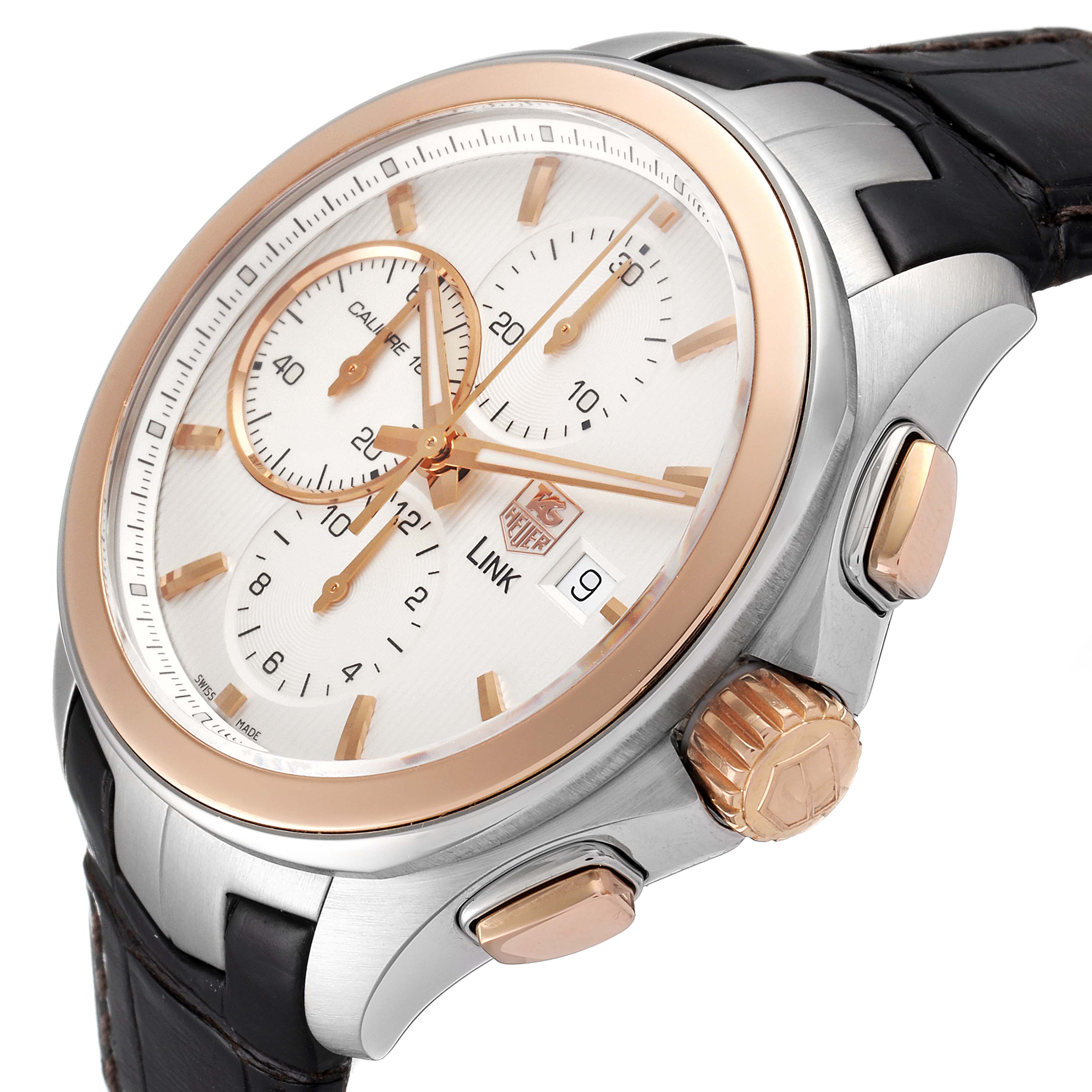 This Tag Heuer Link CAT2050.FC6322 Men's Steel and Gold (two tone) Silver Dial CAT2050.FC6322 Men's Steel and Gold (two tone) Silver Dial watch is shown at an angle highlighting the crown, pushers, dial, and part of the strap.