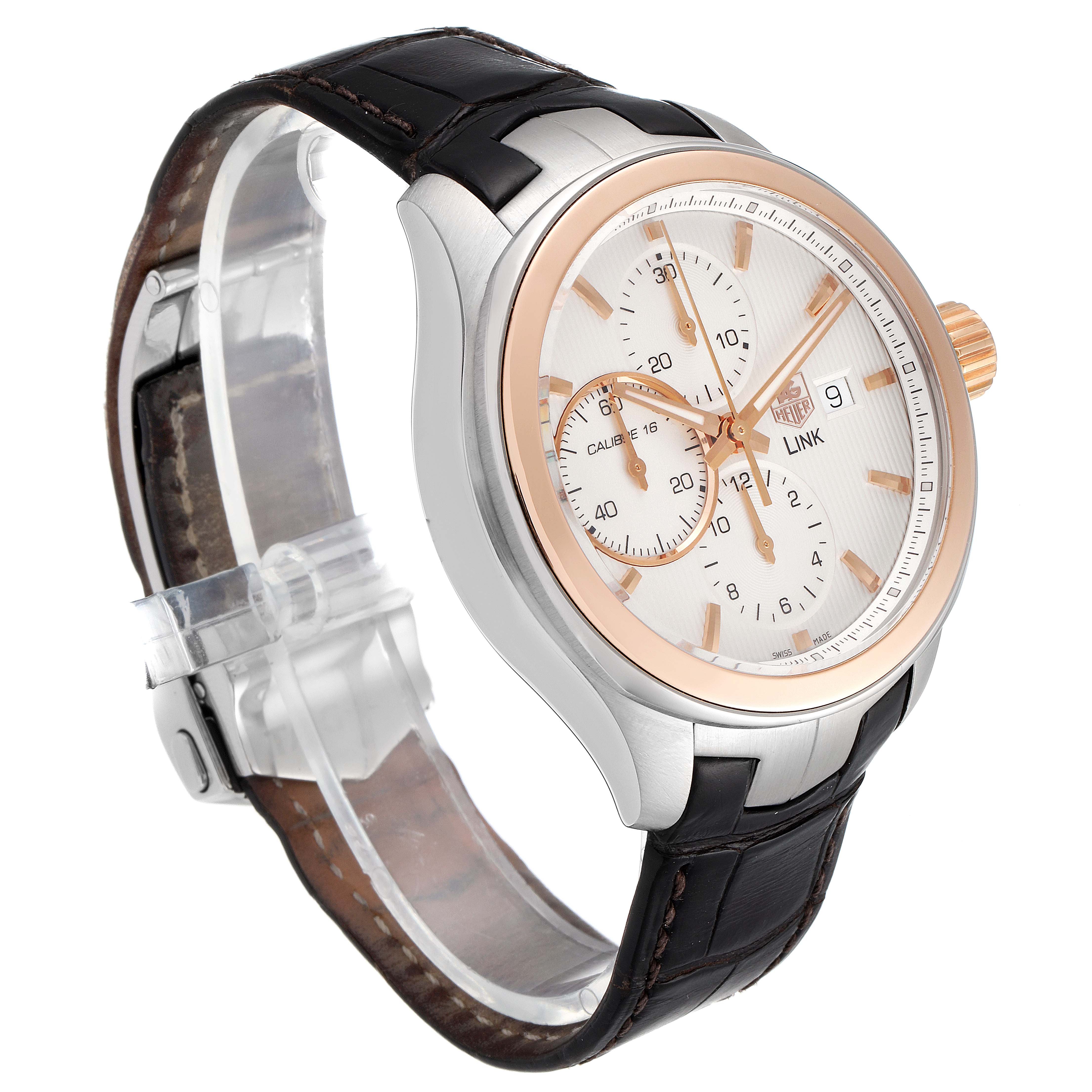 The image shows a Tag Heuer Link CAT2050.FC6322 Men's Steel and Gold (two tone) Silver Dial CAT2050.FC6322 Men's Steel and Gold (two tone) Silver Dial model watch at a three-quarter angle featuring the dial, bezel, case, and leather strap.