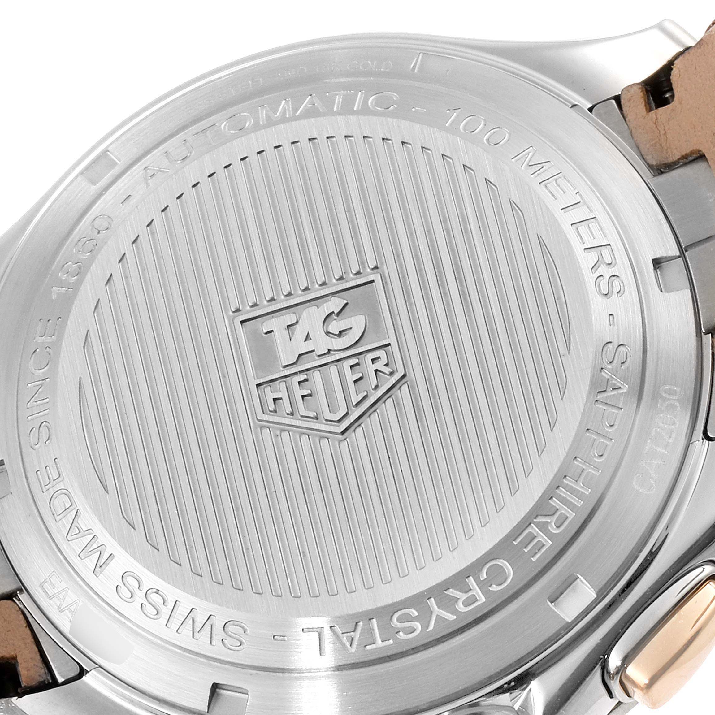 The image shows the back case of a Tag Heuer Link CAT2050.FC6322 Men's Steel and Gold (two tone) Silver Dial CAT2050.FC6322 Men's Steel and Gold (two tone) Silver Dial model watch, emphasizing the engraved logo and specifications.