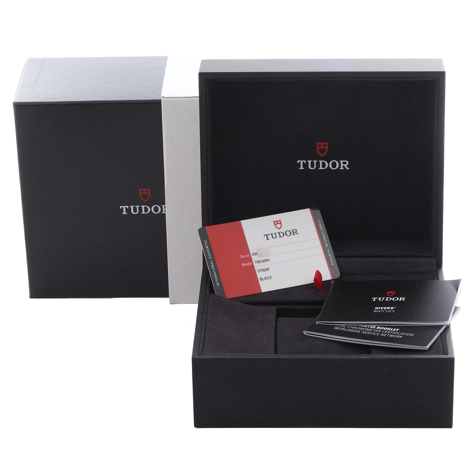 The image shows a Tudor Heritage Black Bay 79030N-0002 Men's Stainless Steel Black Dial 79030N-0002 Men's Stainless Steel Black Dial watch box, open with a warranty card and booklet visible inside.