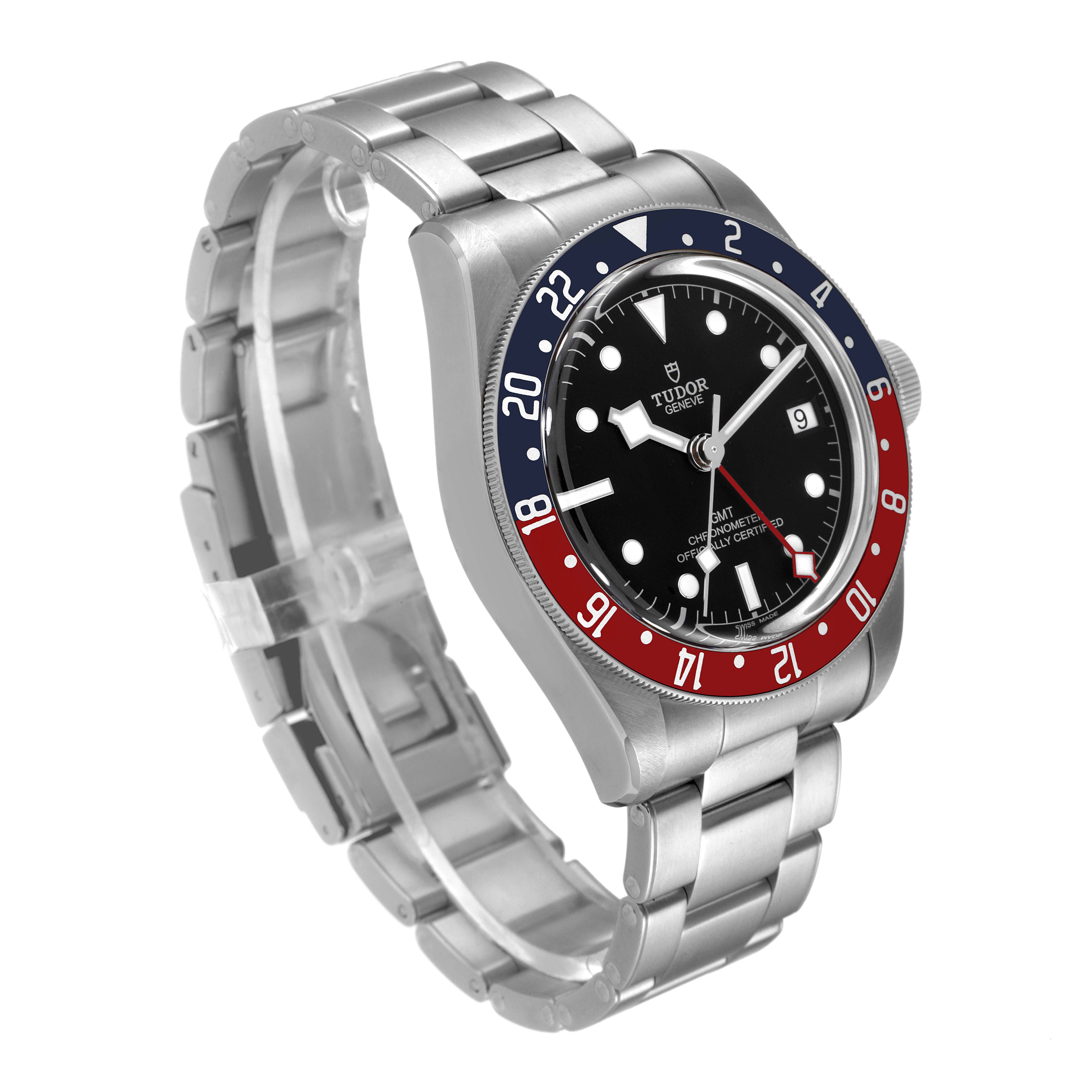 The Heritage Black Bay watch by Tudor is shown at a slight angle, displaying its face, bezel, and metal bracelet.
