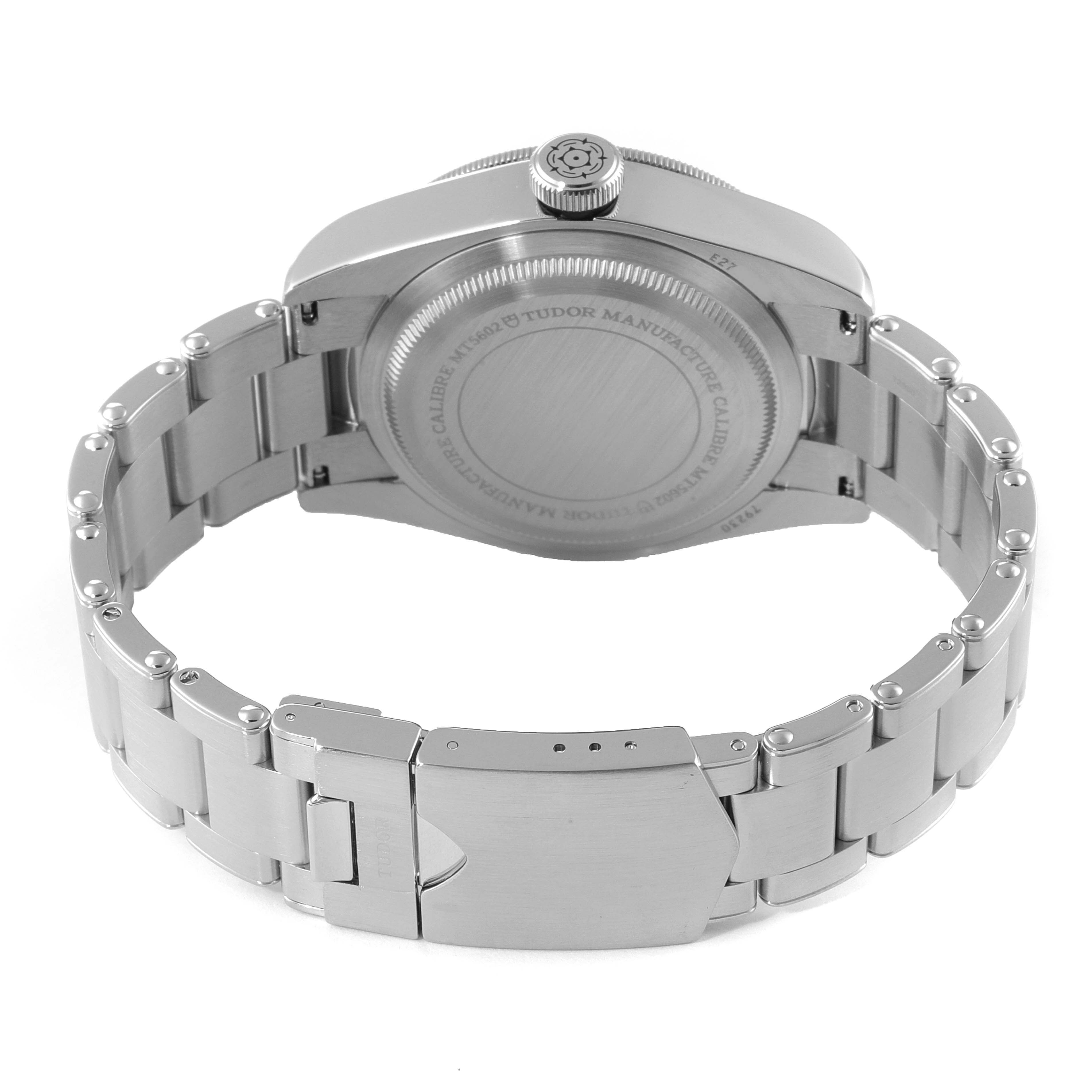 The image shows the back view of the Tudor Heritage Black Bay 79230 Men's Stainless Steel Black Dial 79230 Men's Stainless Steel Black Dial watch, highlighting the case back and bracelet.