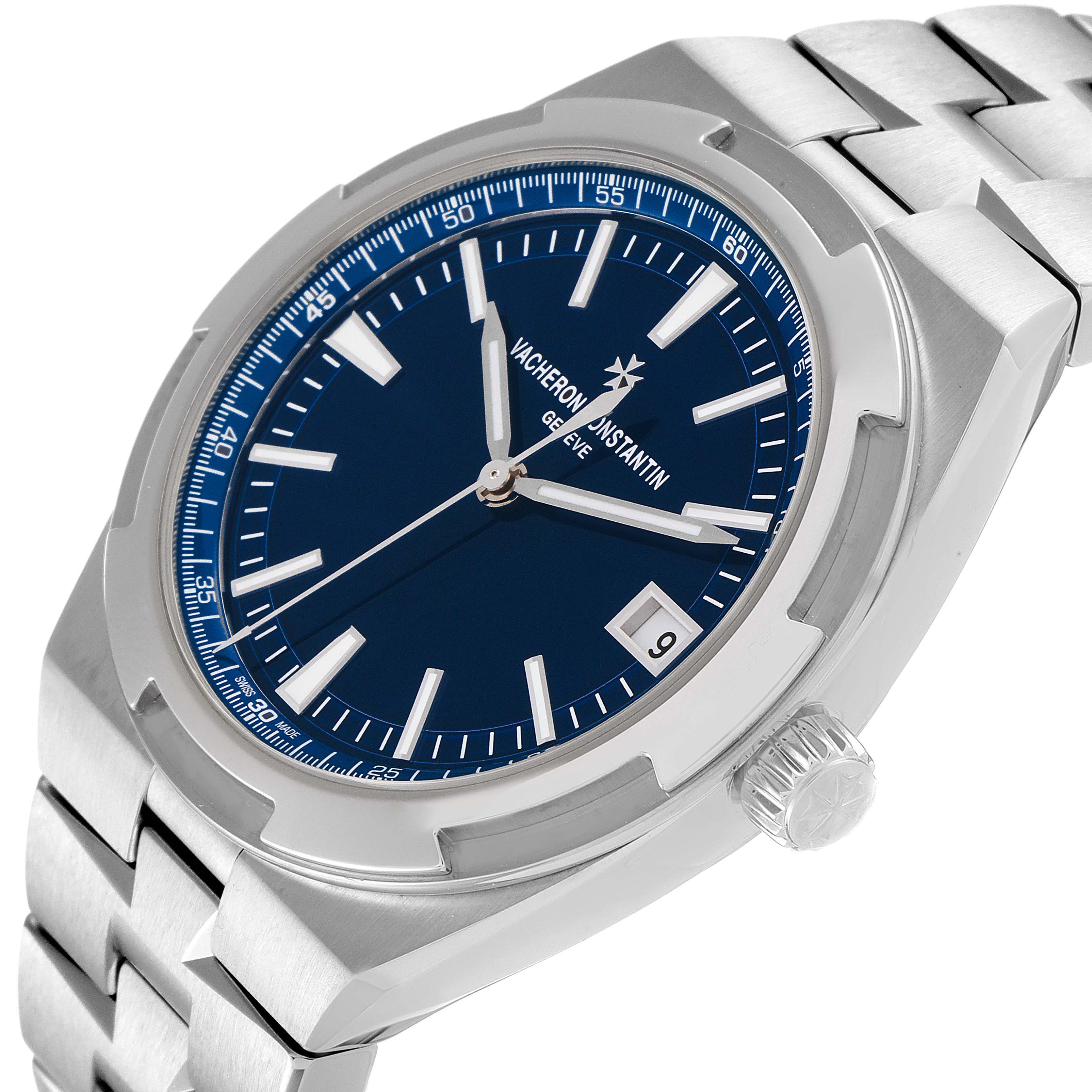 The image shows a Vacheron Constantin Overseas 4500V/110A-B128 Men's Stainless Steel Blue Dial 4500V/110A-B128 Men's Stainless Steel Blue Dial watch at an angled close-up, highlighting the dial, bezel, crown, and part of the bracelet.