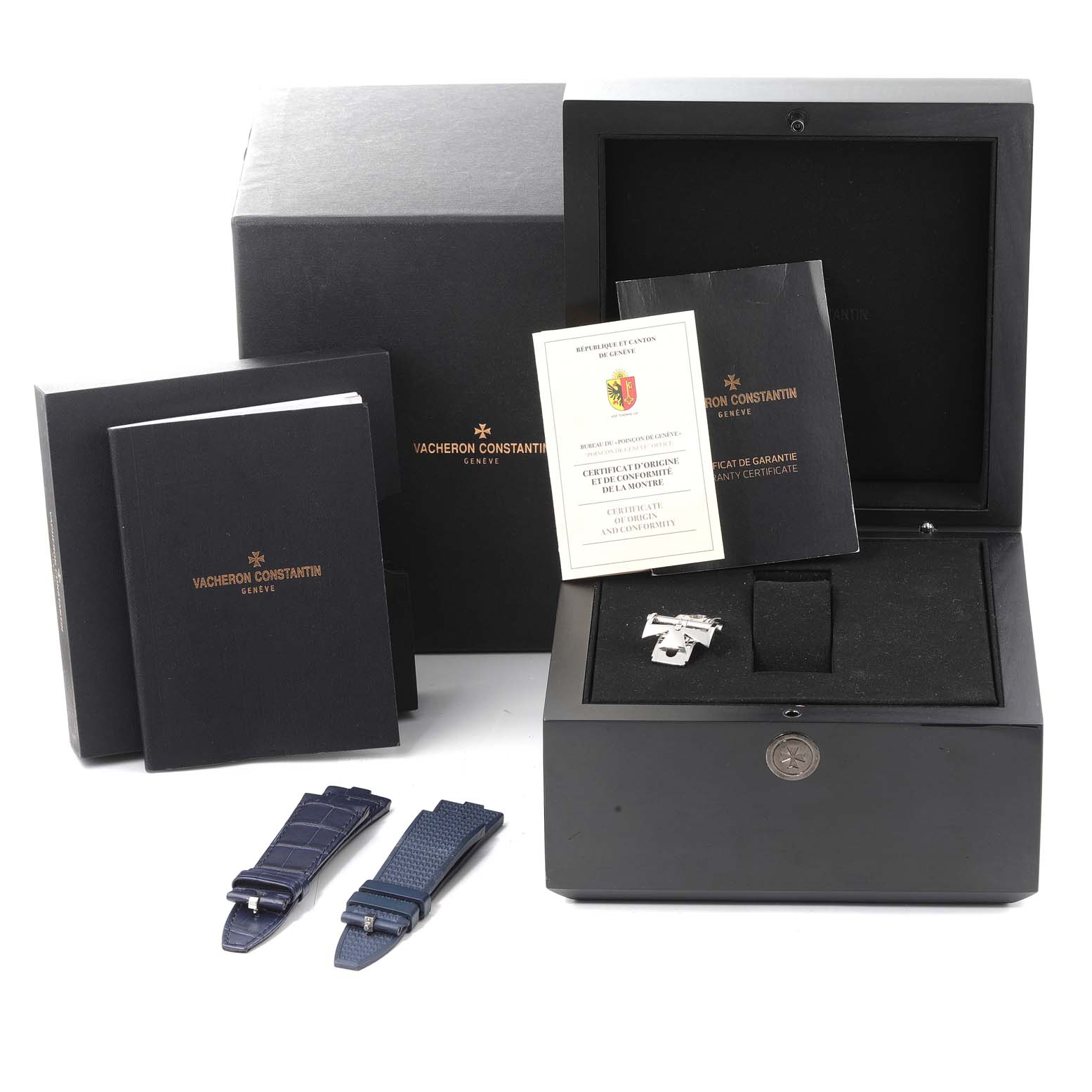 The image features a Vacheron Constantin Overseas 4500V/110A-B128 Men's Stainless Steel Blue Dial 4500V/110A-B128 Men's Stainless Steel Blue Dial watch box with manuals, certificate, and additional straps seen from a front angle.
