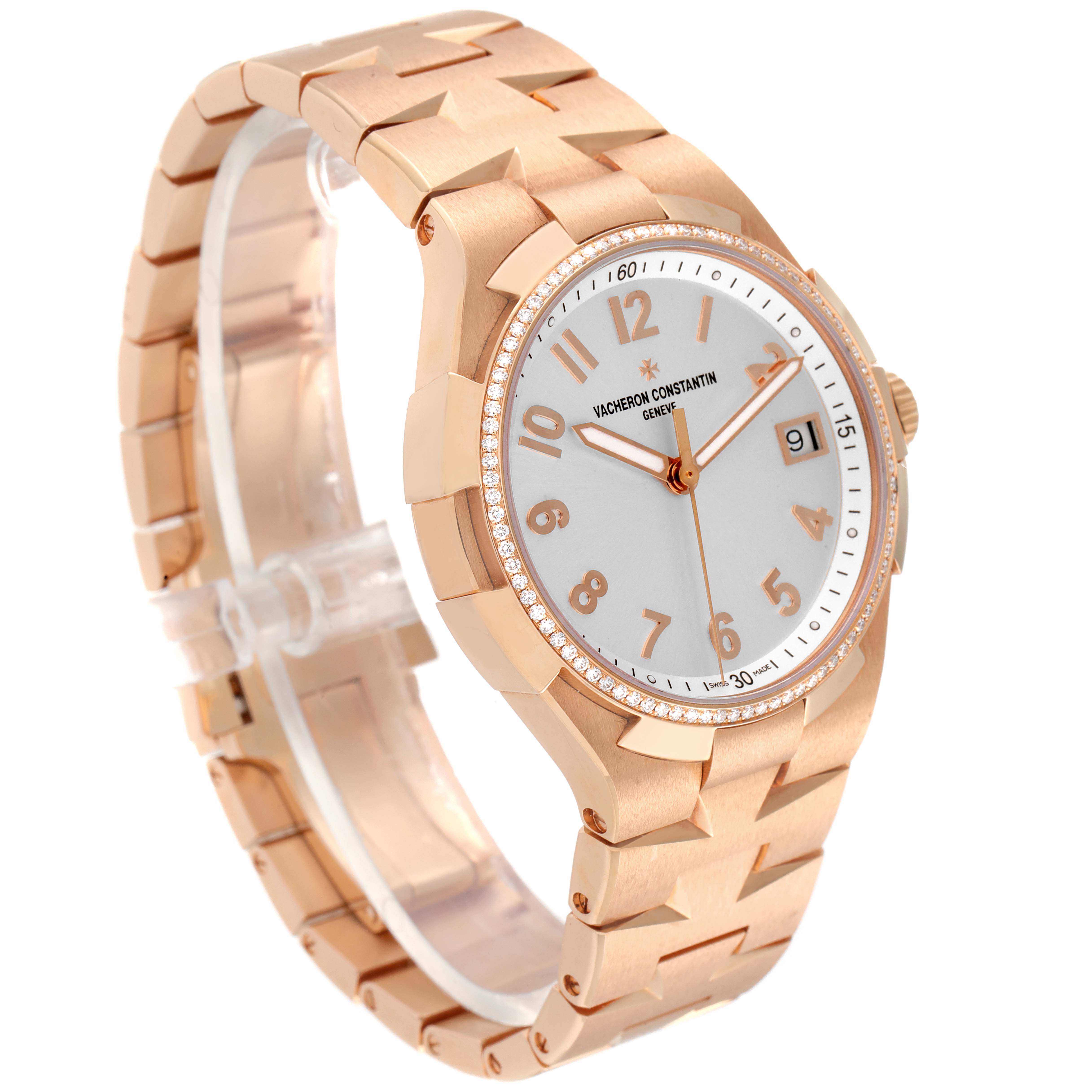 The image shows a Vacheron Constantin Overseas 47560/D01R-9672 Women's Rose Gold Silver Dial 47560/D01R-9672 Women's Rose Gold Silver Dial watch angled to display the face, bracelet, crown, and part of the side.