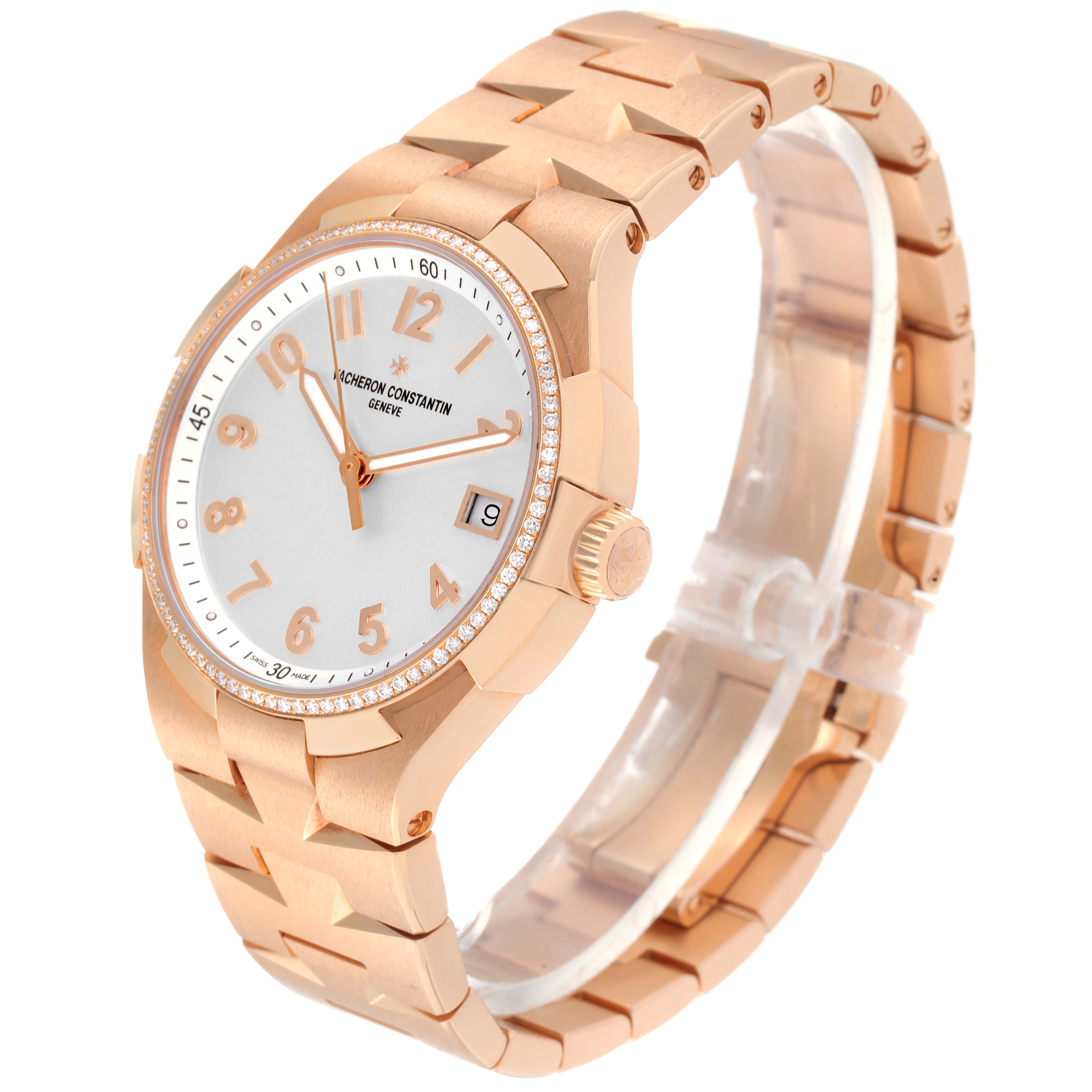 The image shows a Vacheron Constantin Overseas 47560/D01R-9672 Women's Rose Gold Silver Dial 47560/D01R-9672 Women's Rose Gold Silver Dial watch at an angled view, highlighting the face, bezel, crown, and bracelet.