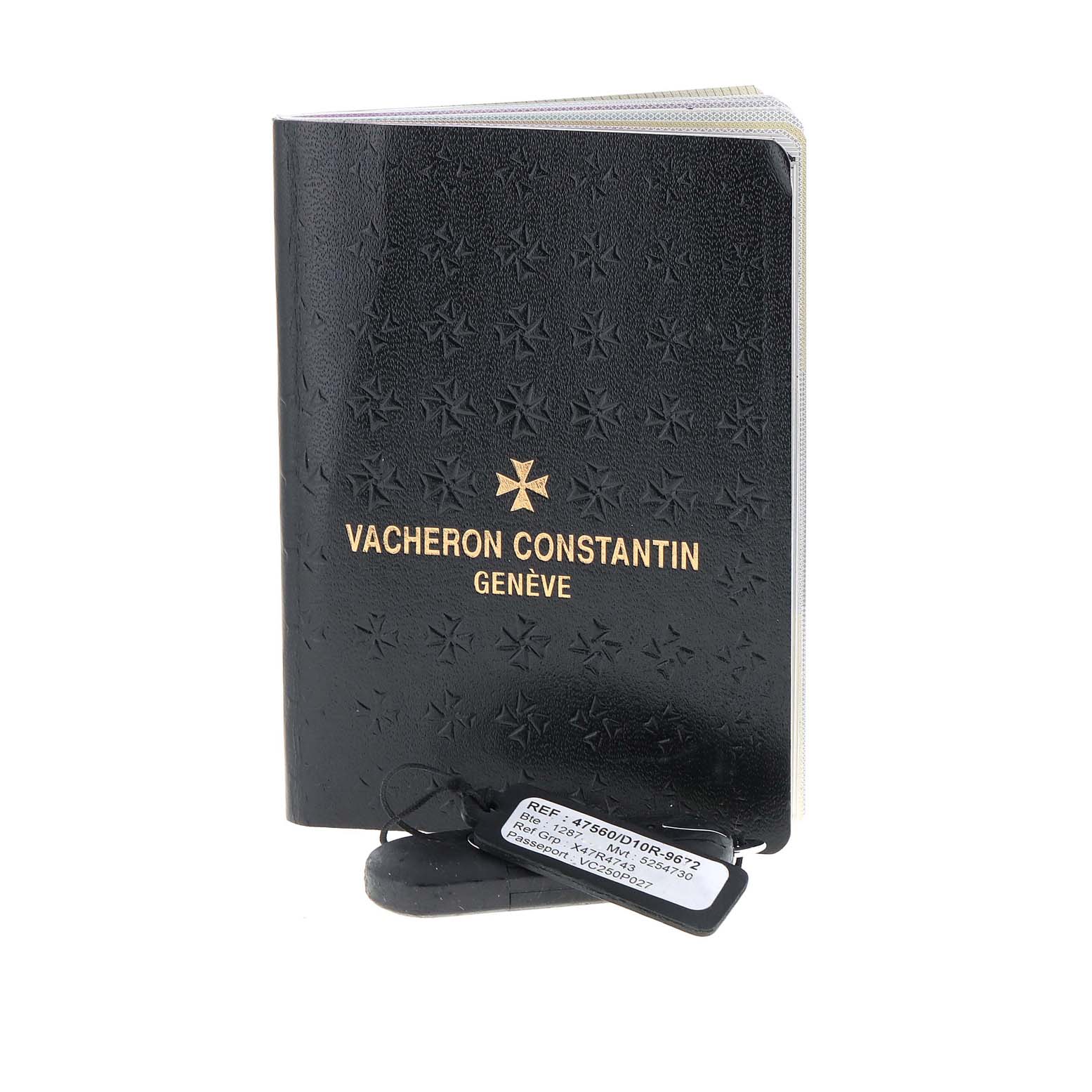 The image shows a Vacheron Constantin Overseas 47560/D01R-9672 Women's Rose Gold Silver Dial 47560/D01R-9672 Women's Rose Gold Silver Dial model booklet with a tag attached.