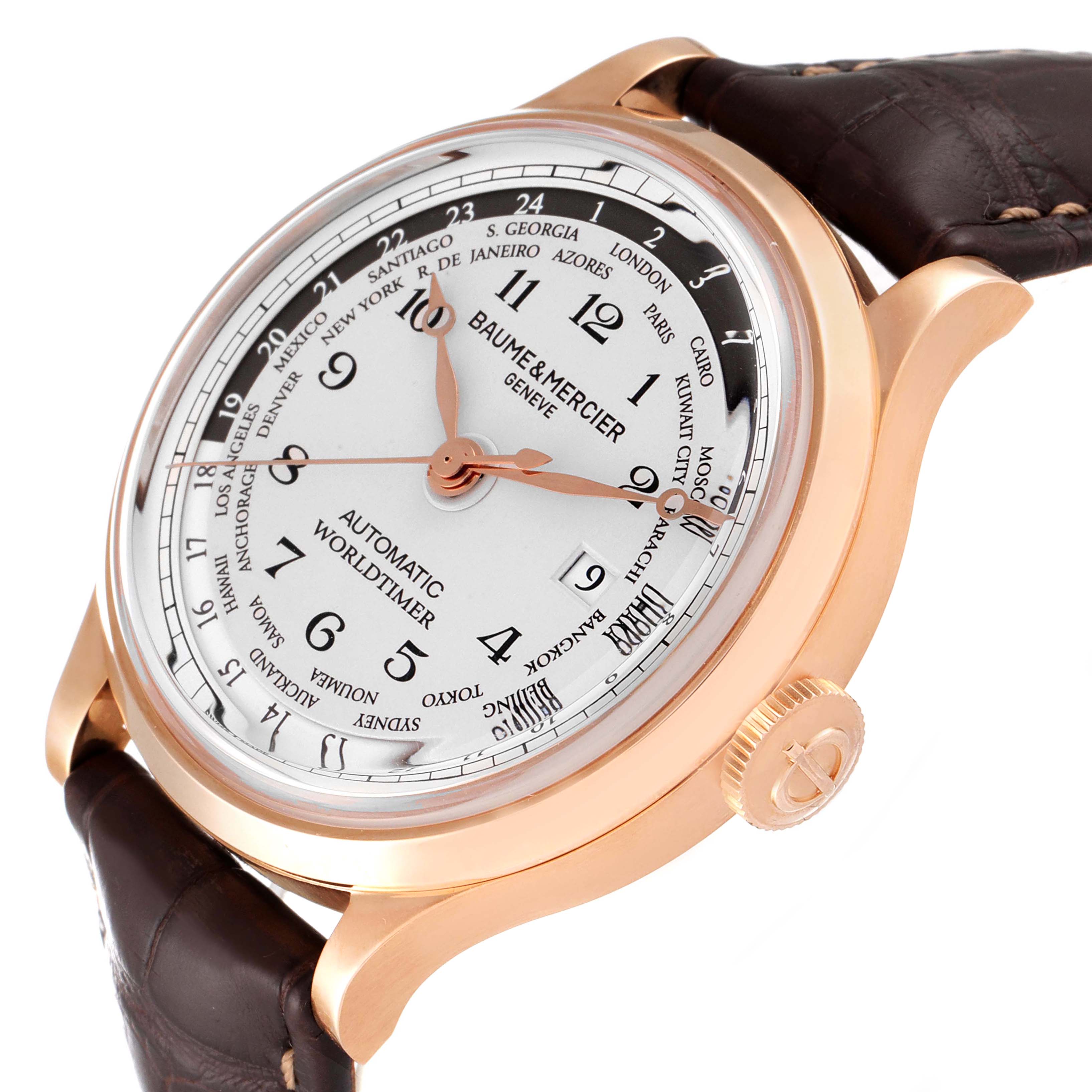 The Baume & Mercier Capeland M0A10107 Men's Rose Gold Silver Dial M0A10107 Men's Rose Gold Silver Dial watch is shown at an angle highlighting the face, crown, and part of the leather strap.