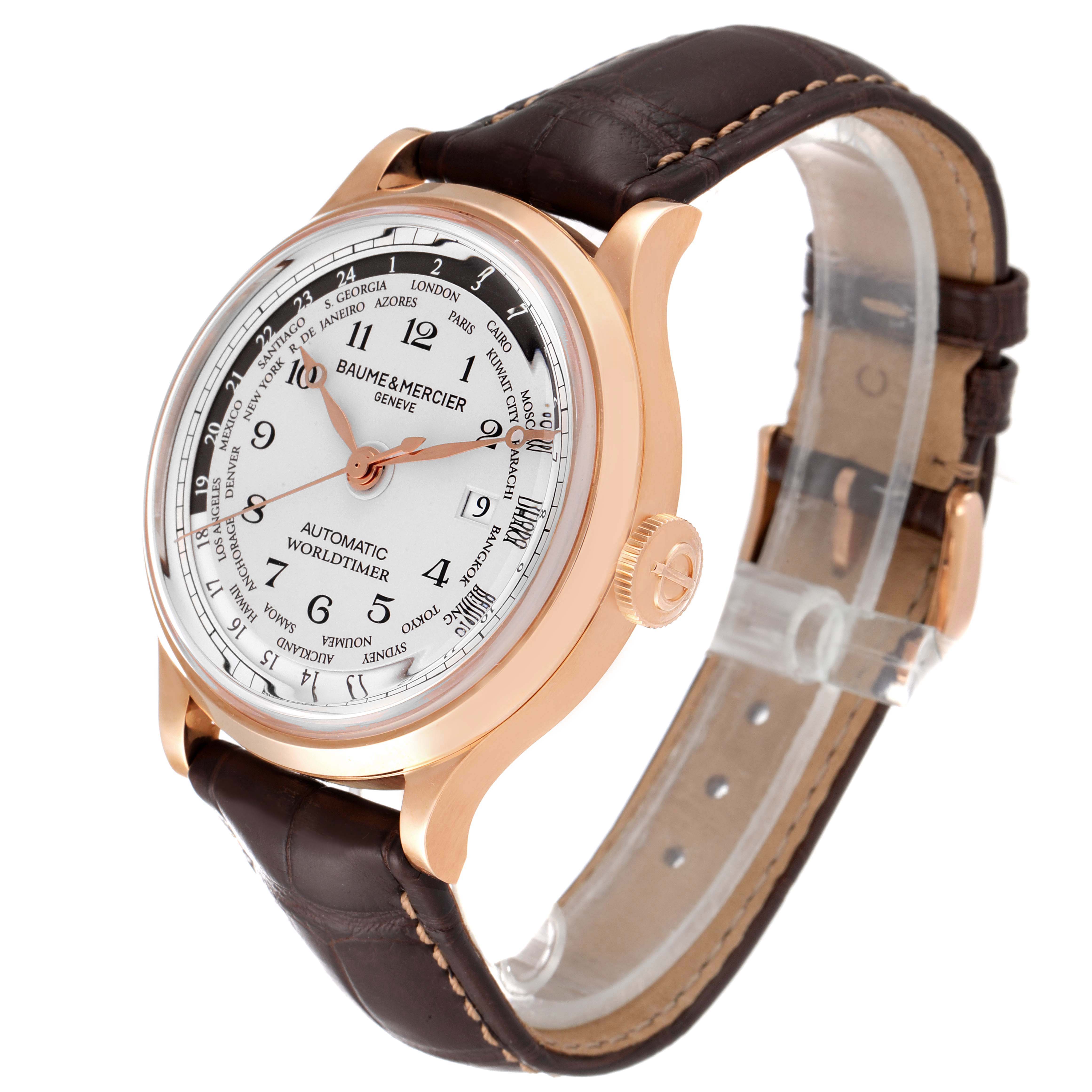This image shows a Baume & Mercier Capeland M0A10107 Men's Rose Gold Silver Dial M0A10107 Men's Rose Gold Silver Dial watch from an angled view, highlighting the face, case, crown, and leather strap.