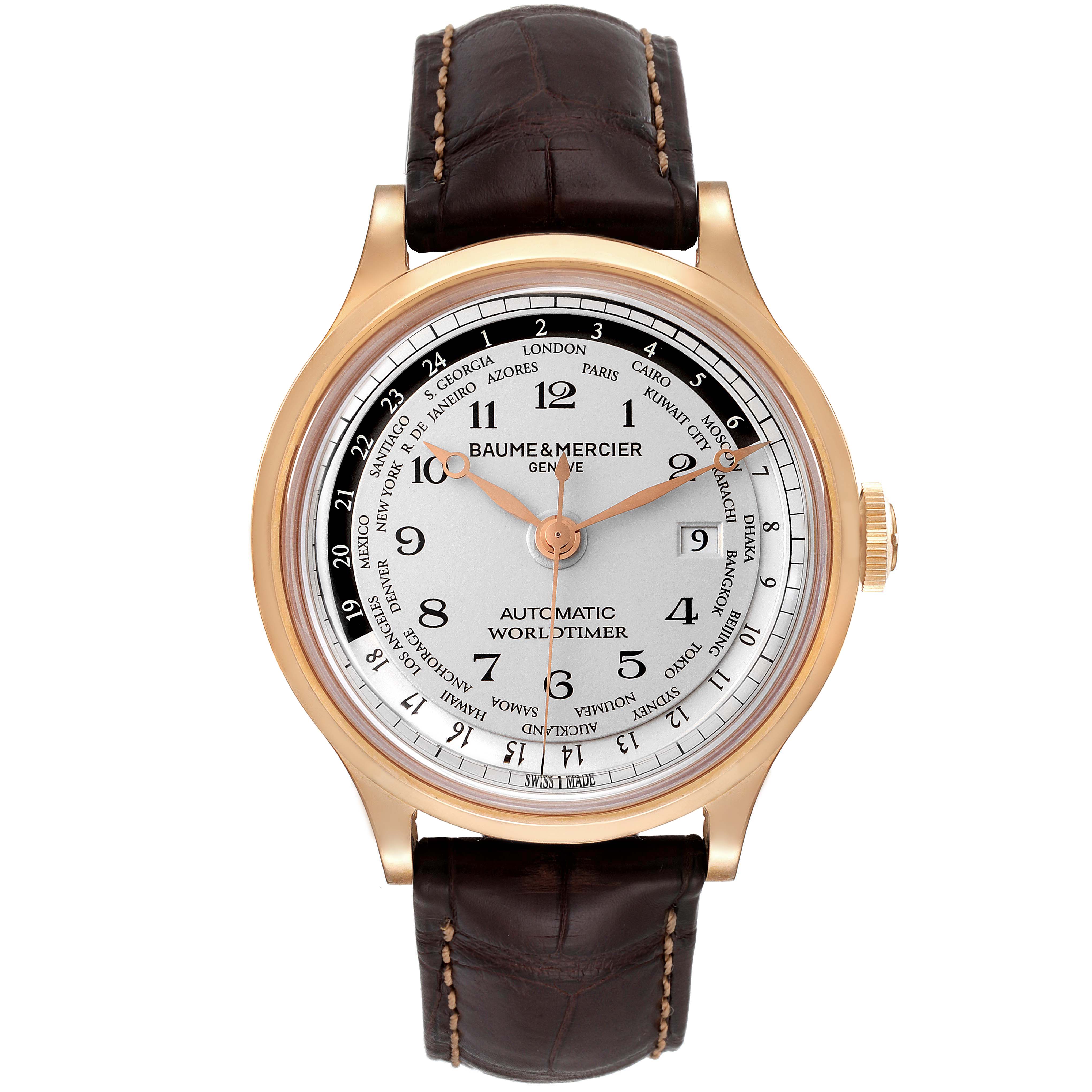 The image shows a front view of the Baume & Mercier Capeland M0A10107 Men's Rose Gold Silver Dial M0A10107 Men's Rose Gold Silver Dial model watch with a leather strap and a detailed world timer dial.