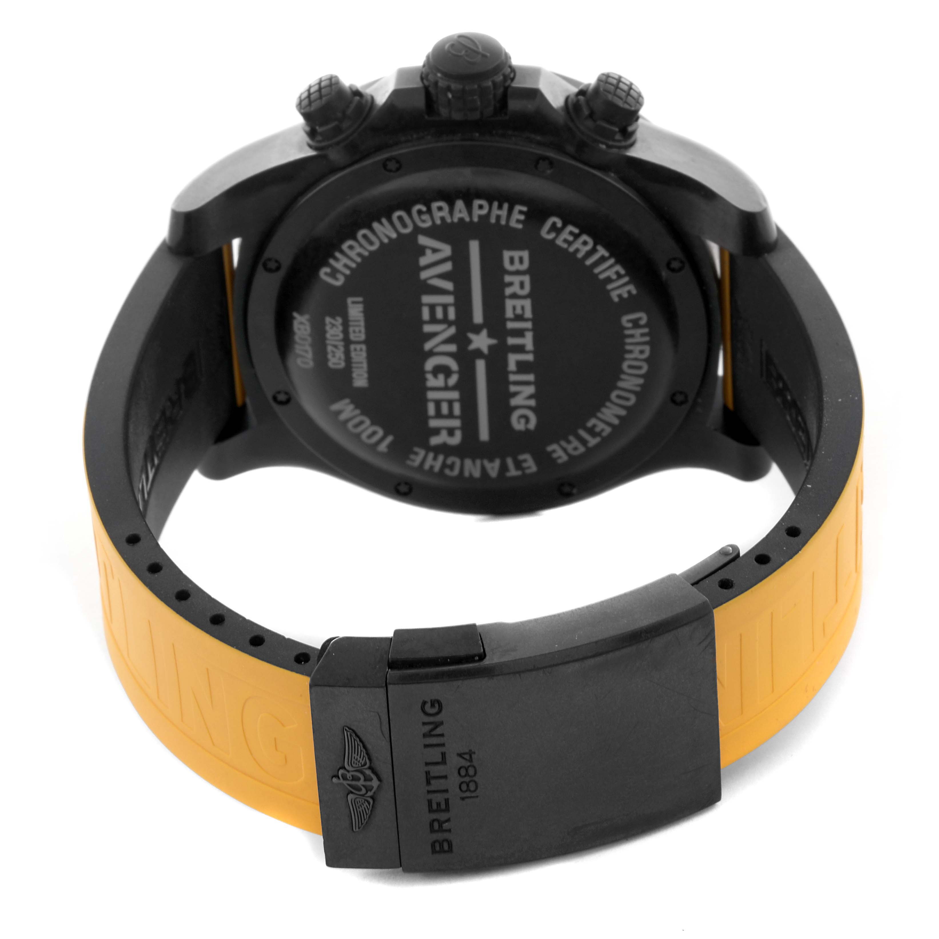 The image shows the back view of a Breitling Avenger XB01701A/BF92 Men's Ceramic Black Dial XB01701A/BF92 Men's Ceramic Black Dial watch, highlighting the case back, crown, pushers, and yellow strap with clasp.
