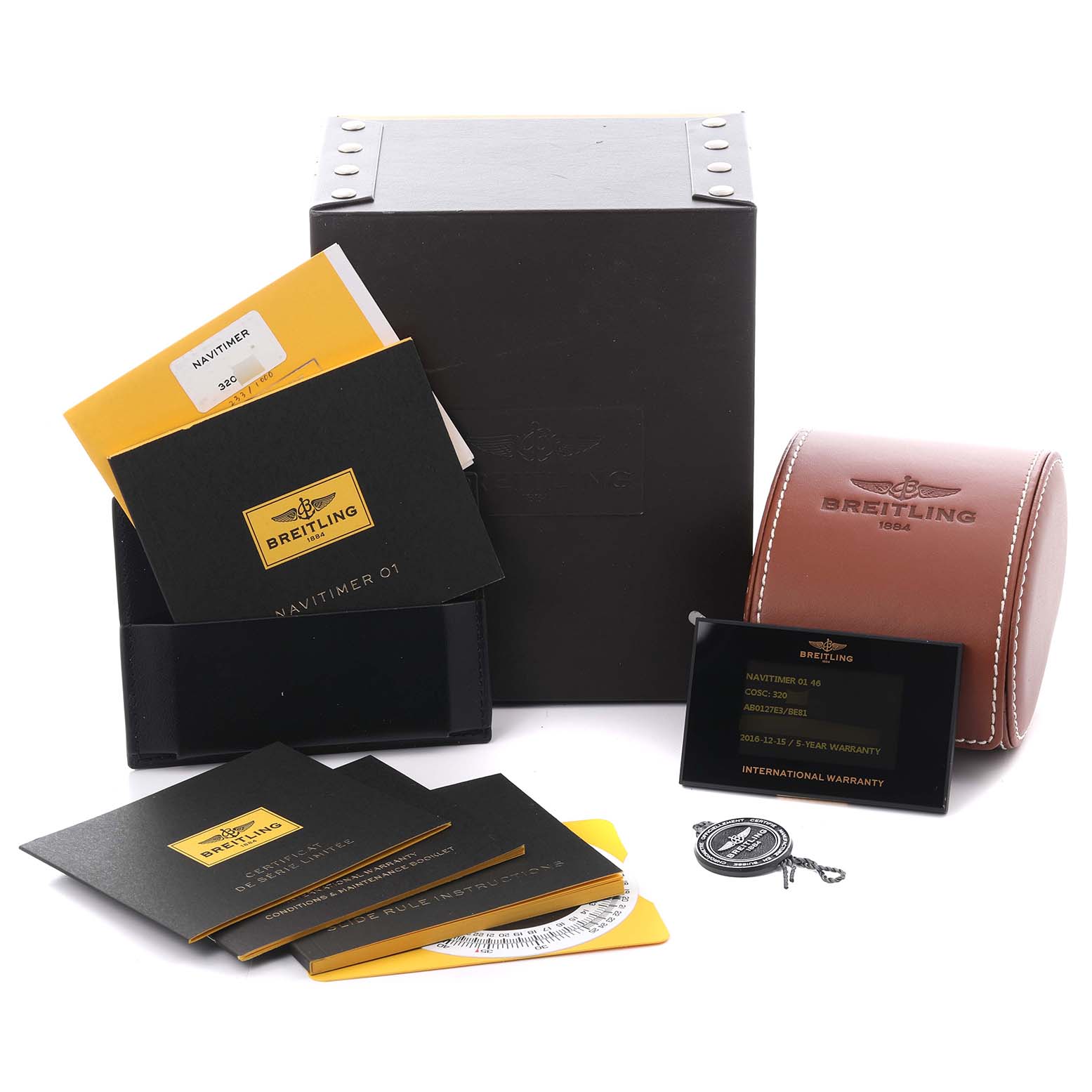 The image shows Breitling Navitimer AB0127E3/BE81 Men
s Stainless Steel Black Dial AB0127E3/BE81 Men
s Stainless Steel Black Dial watch packaging, including boxes, warranty cards, manuals, and a case from a frontal angle.