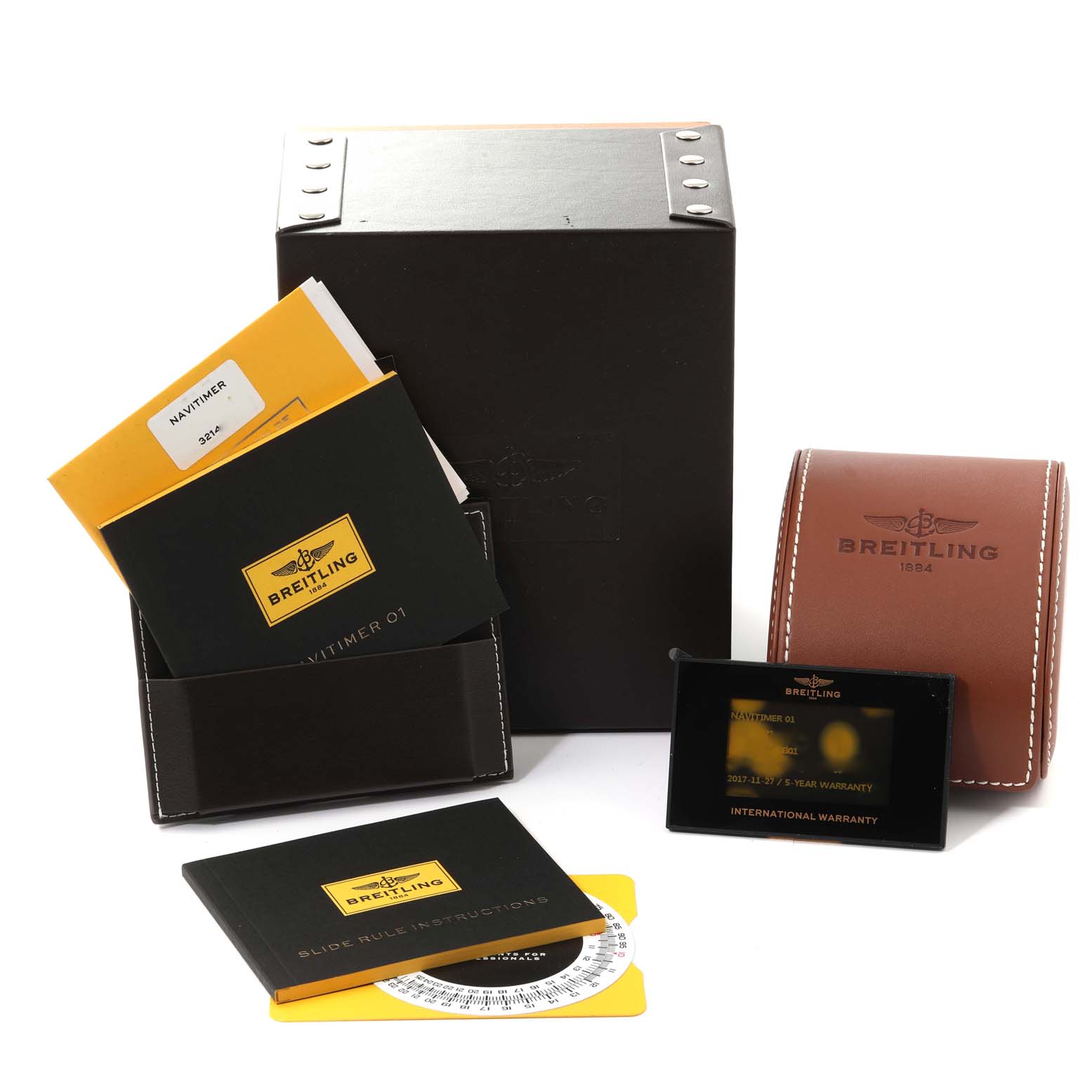 Breitling Navitimer AB0120 Men's Stainless Steel Black Dial AB0120 Men's Stainless Steel Black Dial watch accessories include a box, leather case, manuals, warranty card, and slide rule instructions.