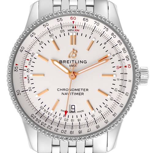 The Breitling Navitimer watch is shown from a front angle, displaying its dial, bezel, and stainless steel bracelet.