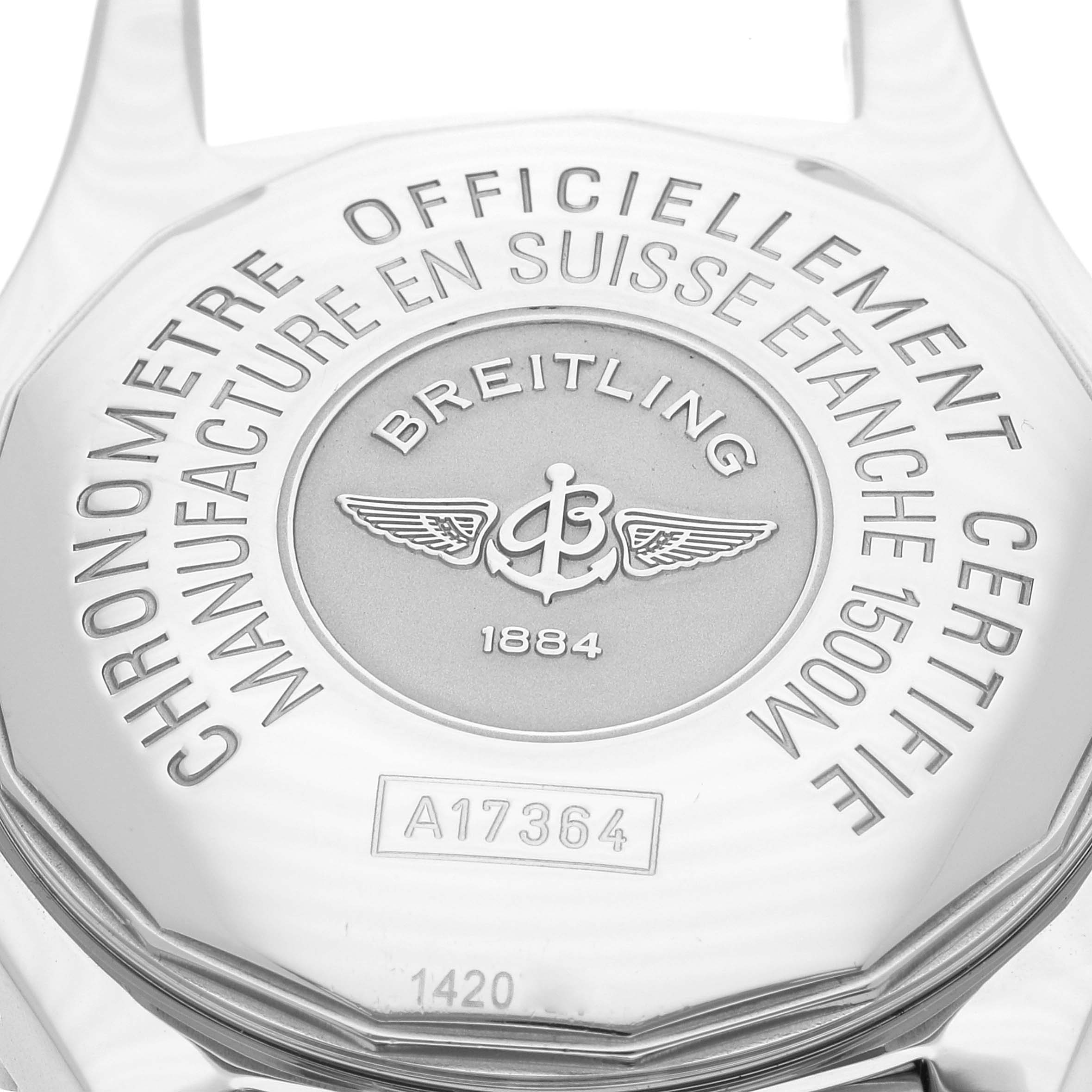 The image shows the close-up view of the back case of a Breitling Superocean A17364 Men's Stainless Steel Black Dial A17364 Men's Stainless Steel Black Dial watch, displaying engravings and insignia.