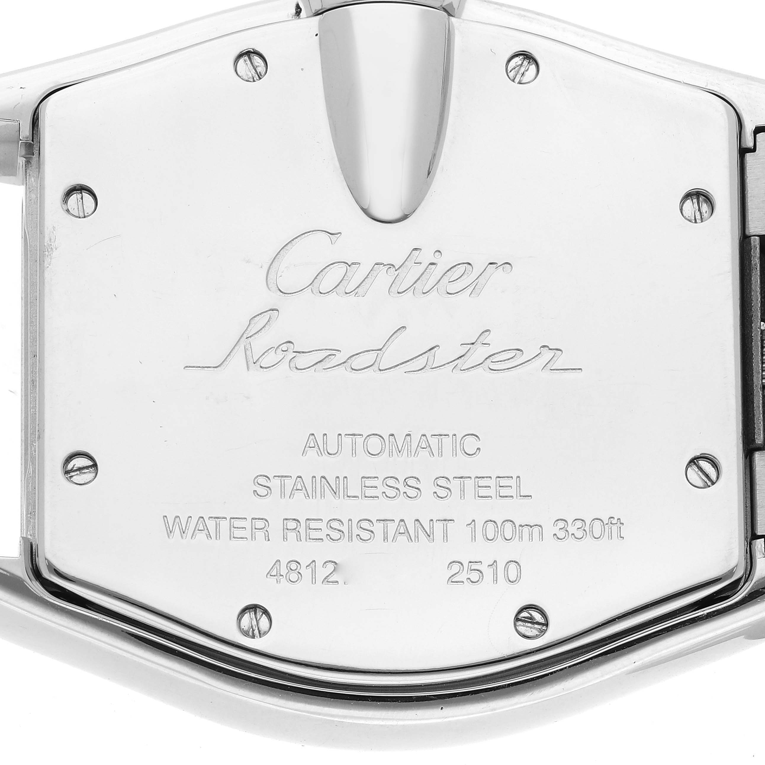 This image shows the back of a Cartier Roadster W62000V3 Men's Stainless Steel Silver Dial W62000V3 Men's Stainless Steel Silver Dial watch, featuring engraving and screws.