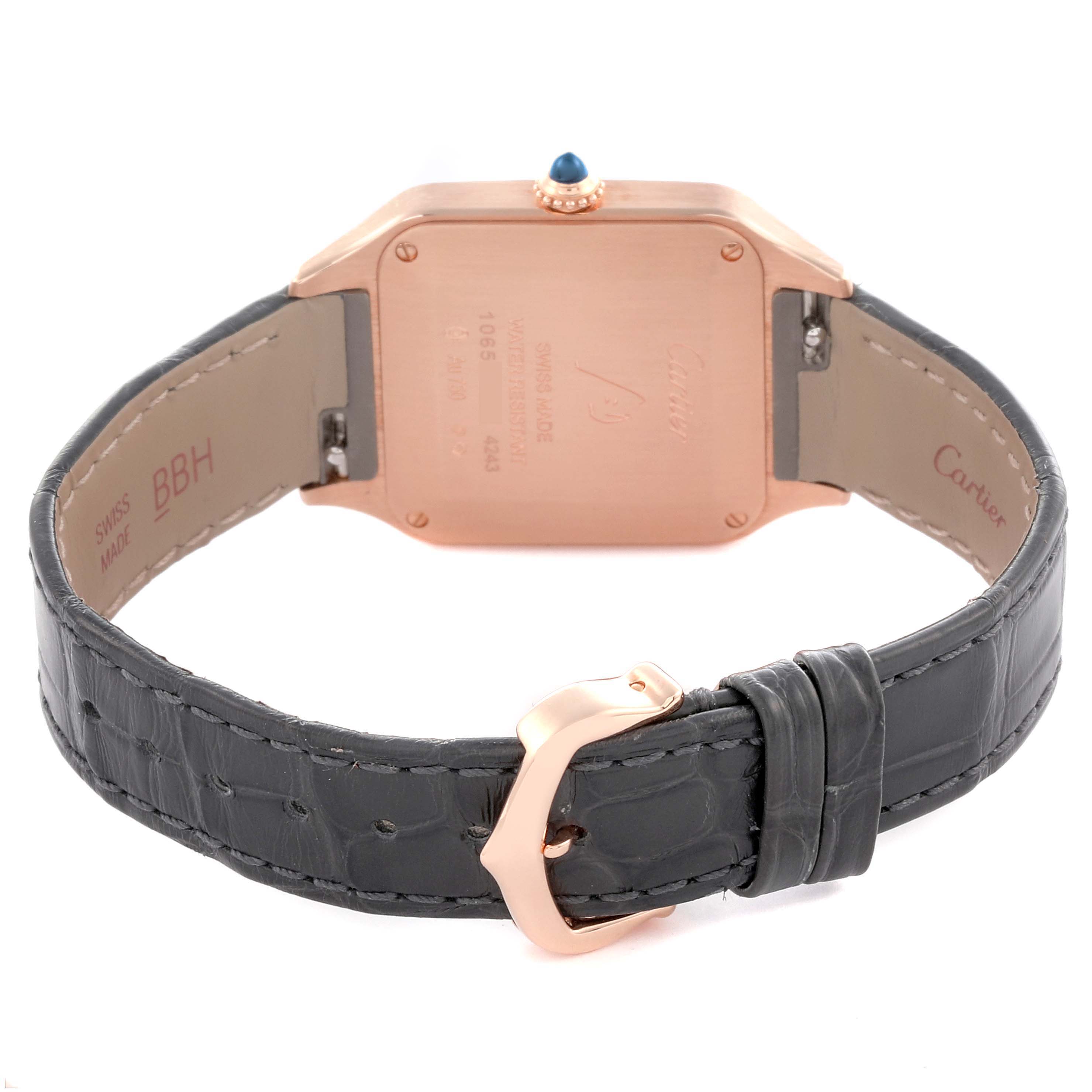 The image shows the back view of a Cartier Santos Dumont WGSA0022 Men
s Rose Gold Silver Dial WGSA0022 Men
s Rose Gold Silver Dial watch with its case back, strap, and buckle visible.