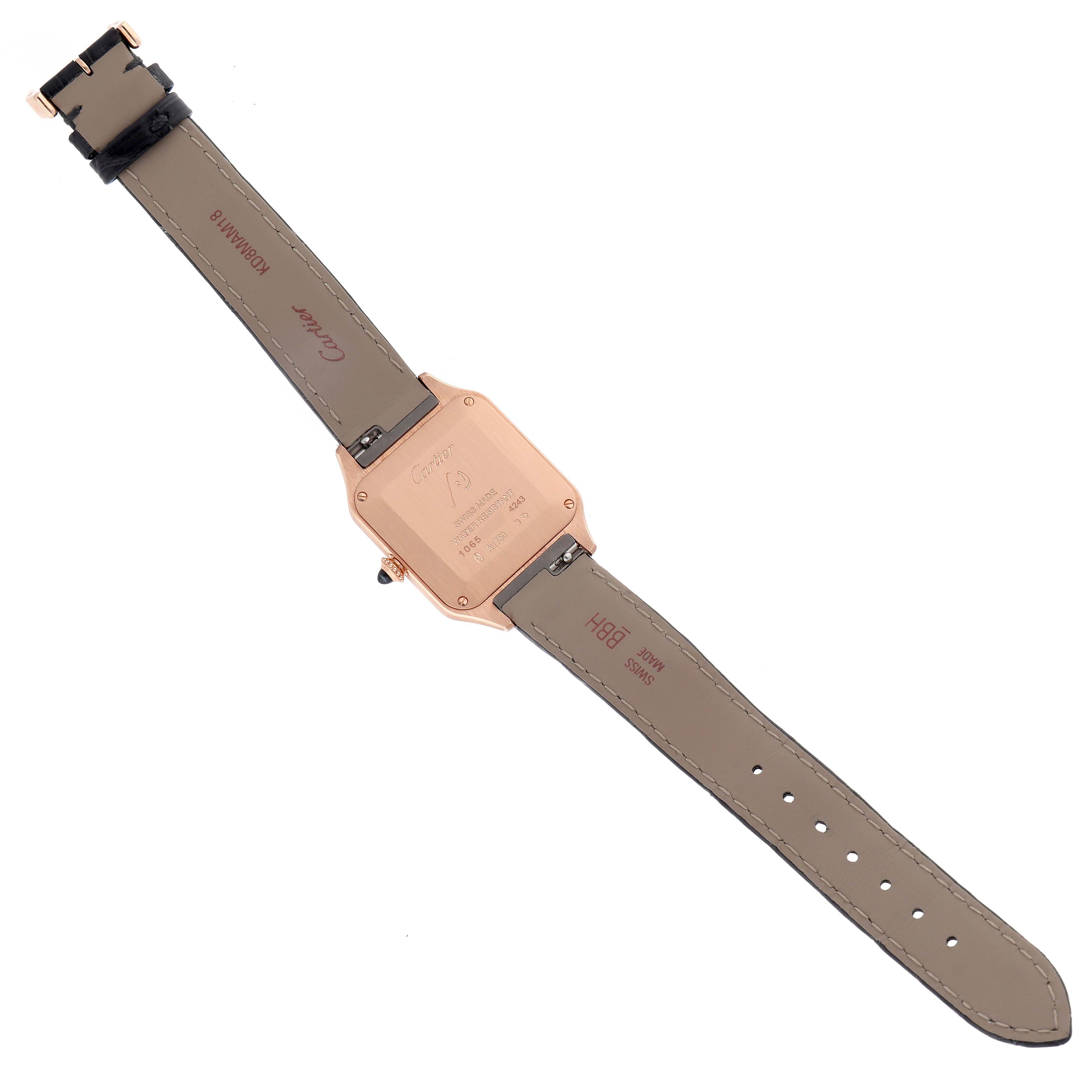 The image shows the back view of the Cartier Santos Dumont WGSA0022 Men
s Rose Gold Silver Dial WGSA0022 Men
s Rose Gold Silver Dial watch, highlighting the case back and strap.